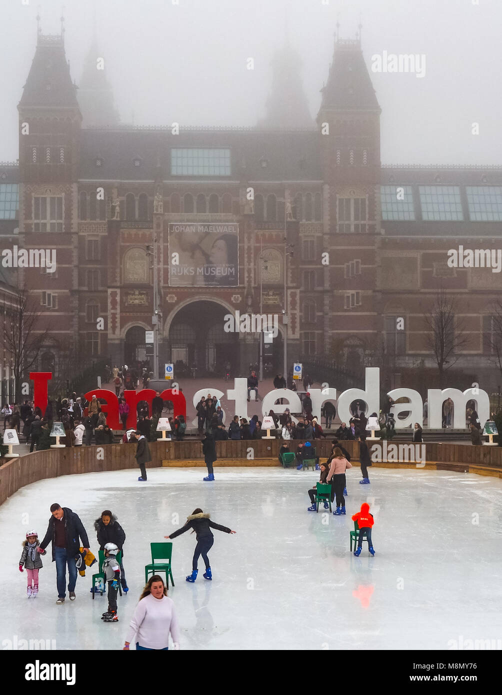 Dec 20, 2017 - People enjoying Ice skating in the gardens of the Rijksmuseum, Amsterdam, Netherlands Stock Photo