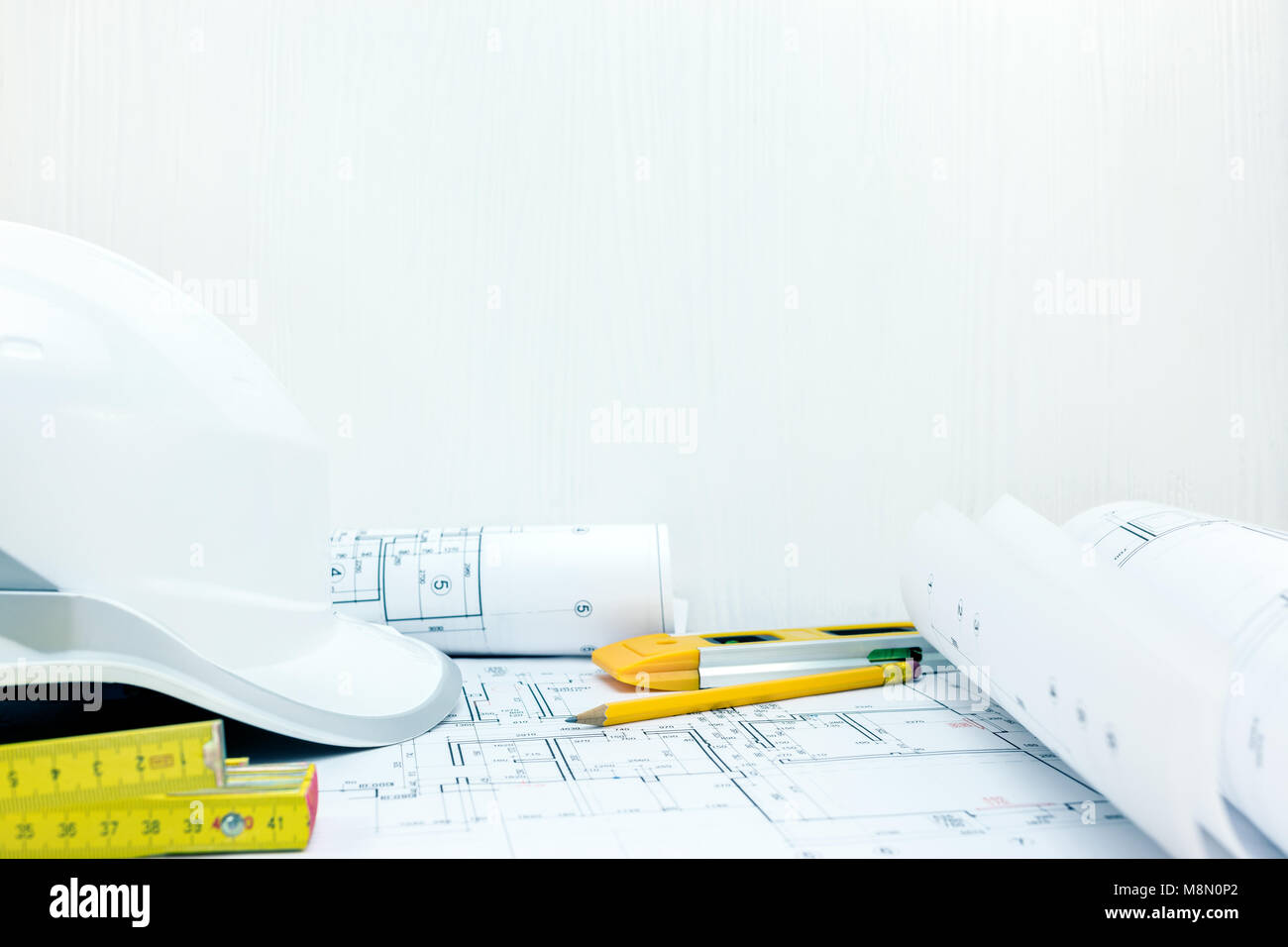 architects and engineering desk view. construction concept. drawing and measuring tools on table