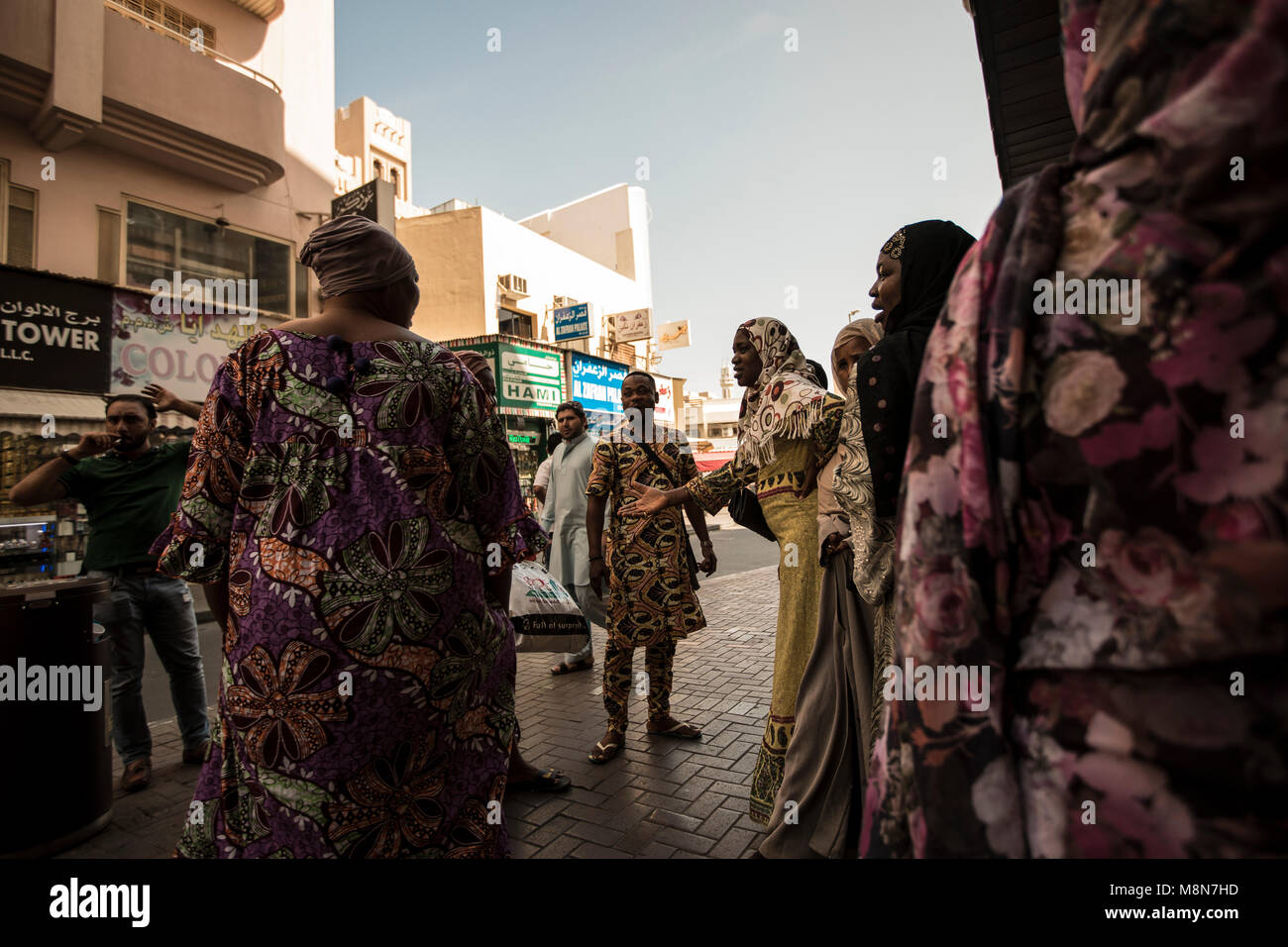 Women wearing hidjab in the street of Dubai, UAE Stock Photo