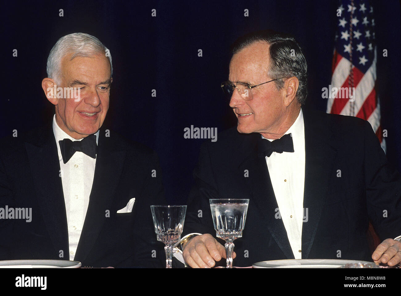 Washington DC, USA,  May 1992 President George H.W. Bush. in Black tie at the White House Correspondents dinner. Seated next to him is Speaker of the House Thomas Foley. Credit: Mark Reinstein/MediaPunch Stock Photo