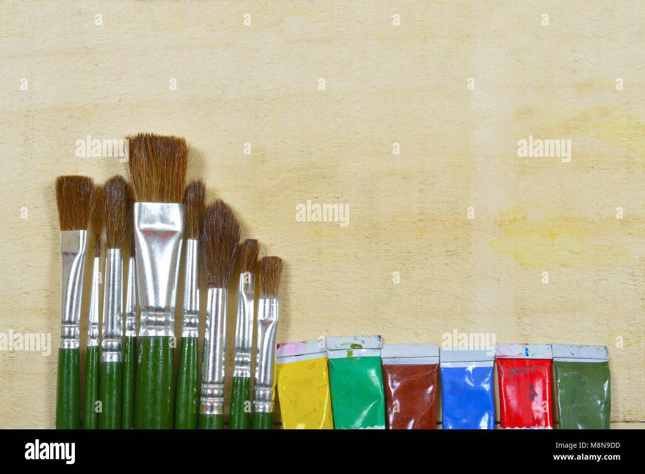 Bunch of artist paintbrushes closeup on canvas Stock Photo - Alamy