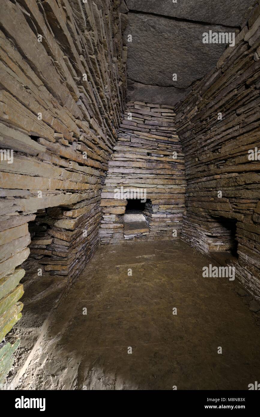 Cuween Hill prehistoric chambered cairn Neolithic communal tomb. Orkney, Scotland. Main chamber showing entrances to 3 of 4 side cells. 5000 years old Stock Photo