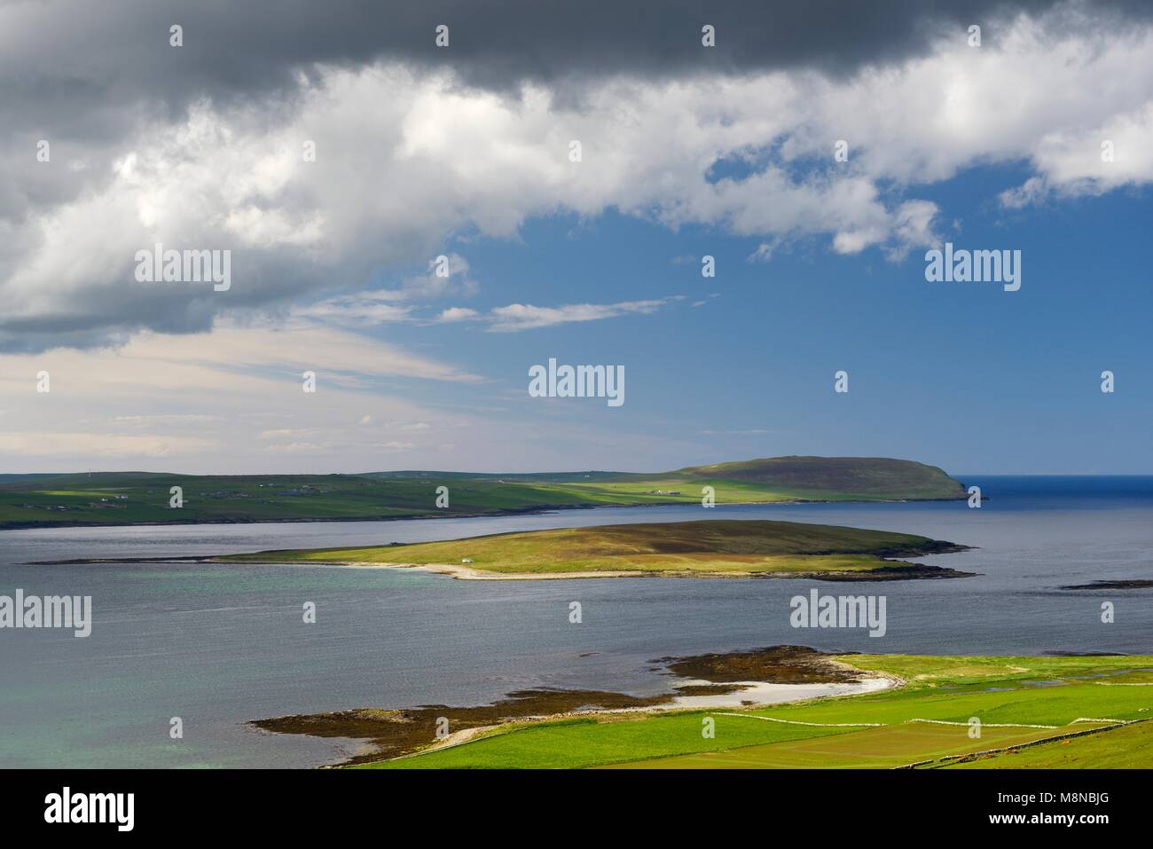 Eynhallow monastic settlement island seen from Westness on Rousay. Orkney, Scotland. Looking west Stock Photo