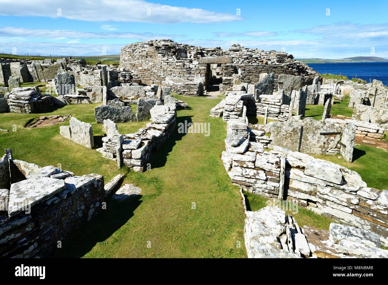 Broch of Gurness Iron Age broch and village archaeological site. West up main approach to broch entrance. Eynhallow Sound, Mainland, Orkney, Scotland Stock Photo
