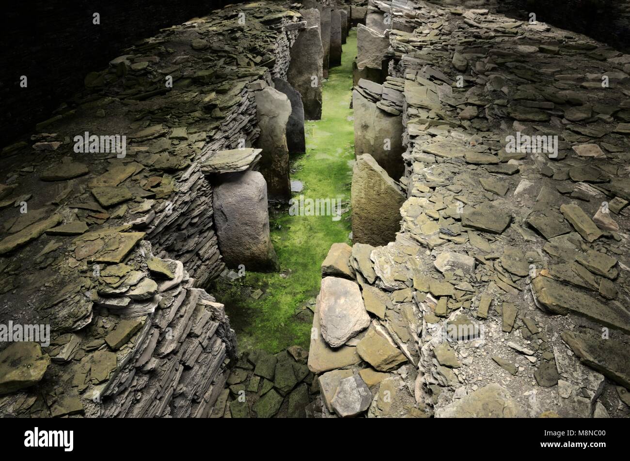 Midhowe prehistoric chambered stalled cairn Neolithic tomb on island of Rousay, Orkney, Scotland. Interior. Orkney-Cromarty type communal burial grave Stock Photo