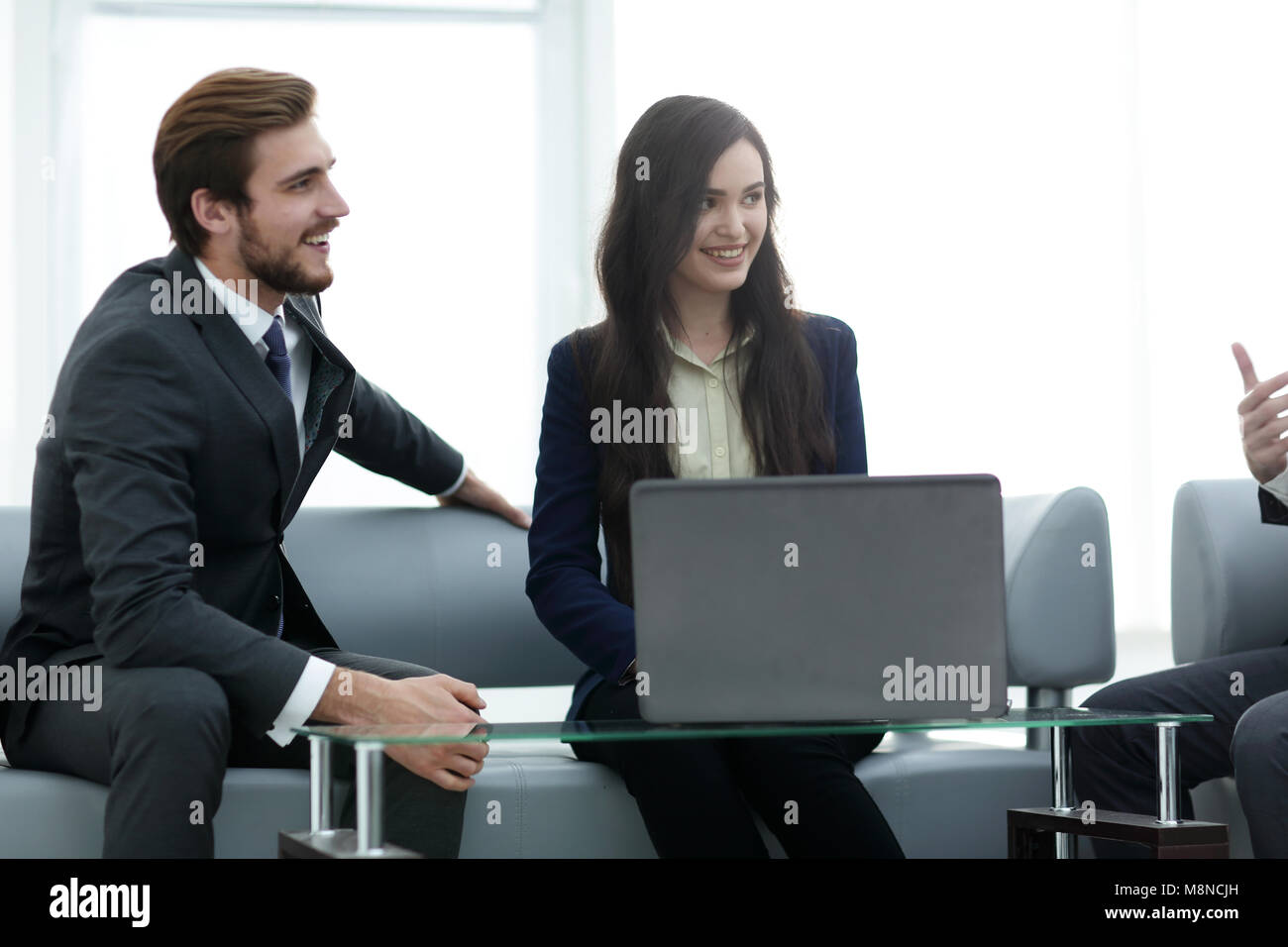 Confident business team working in an office Stock Photo - Alamy