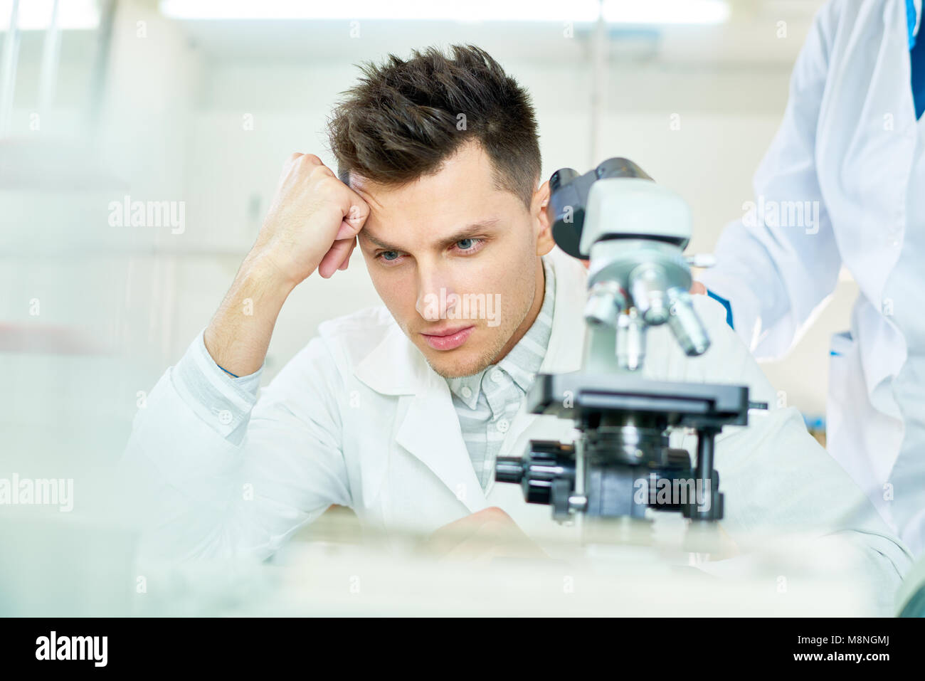 Dissatisfied Researcher at Modern Lab Stock Photo