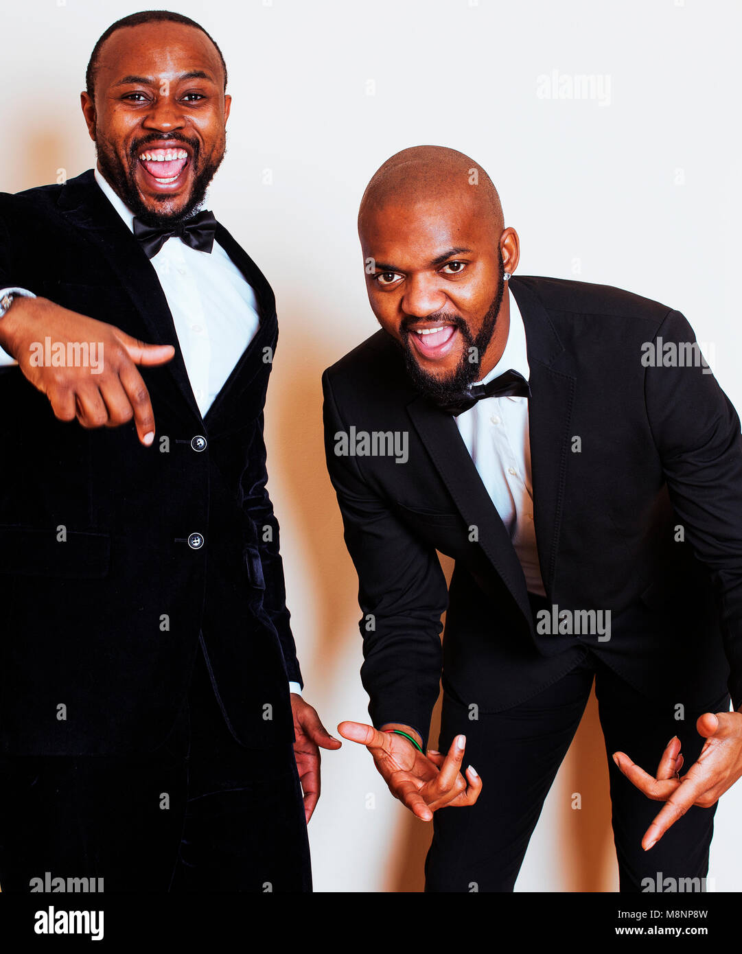 two afro-american businessmen in black suits emotional posing, g Stock ...