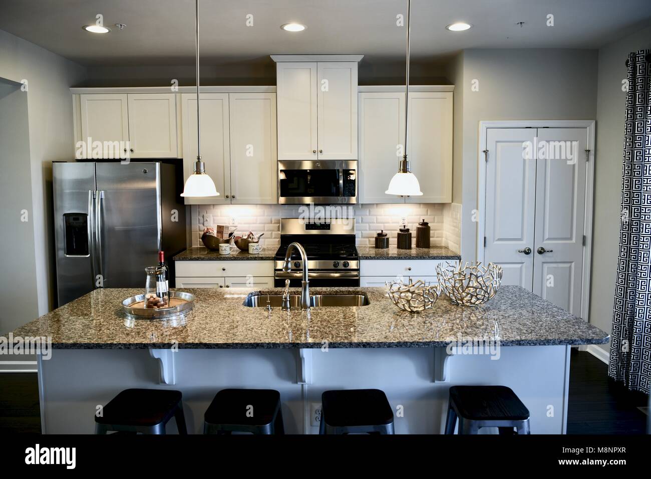 Modern kitchen view inside contemporary home Stock Photo