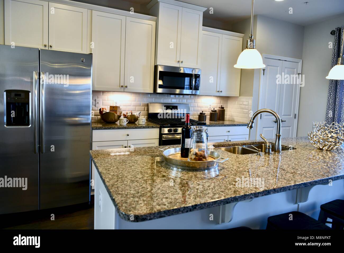 Modern kitchen view inside contemporary home Stock Photo
