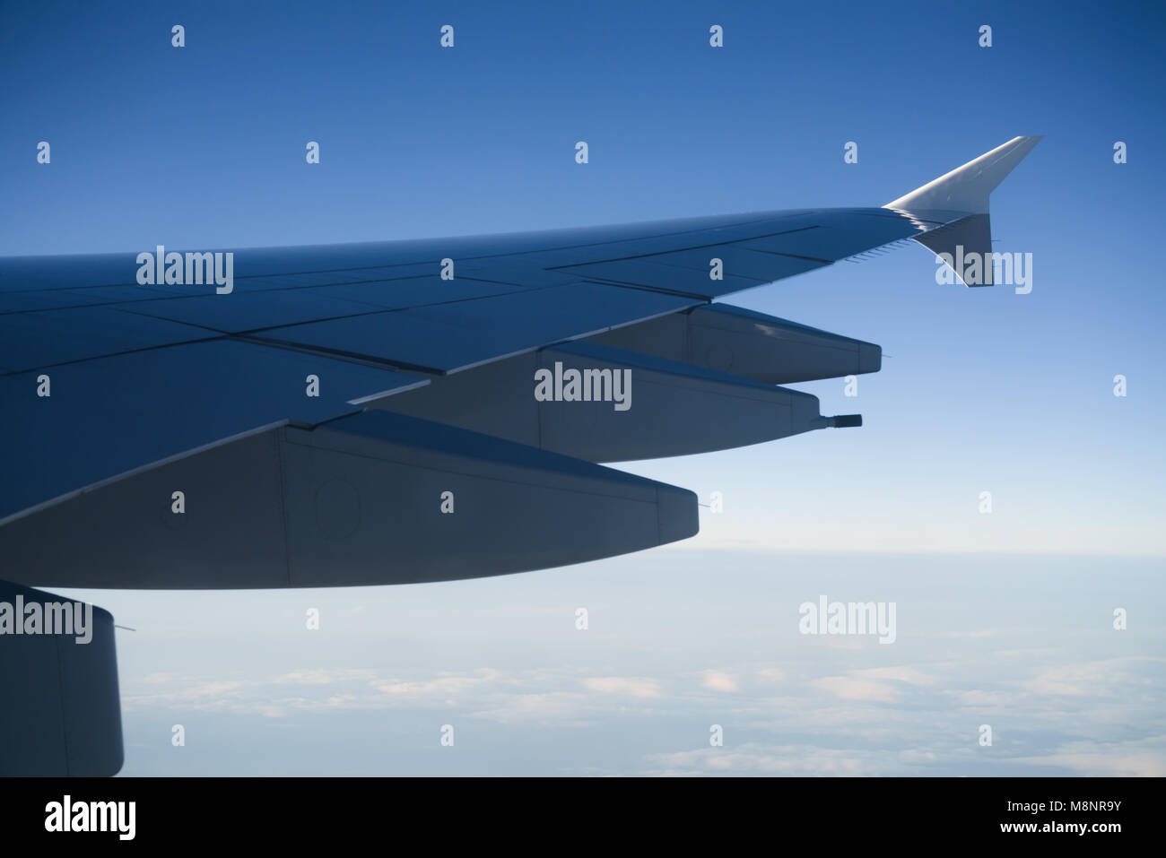 view of airplane wing during flight, travel photo Stock Photo - Alamy