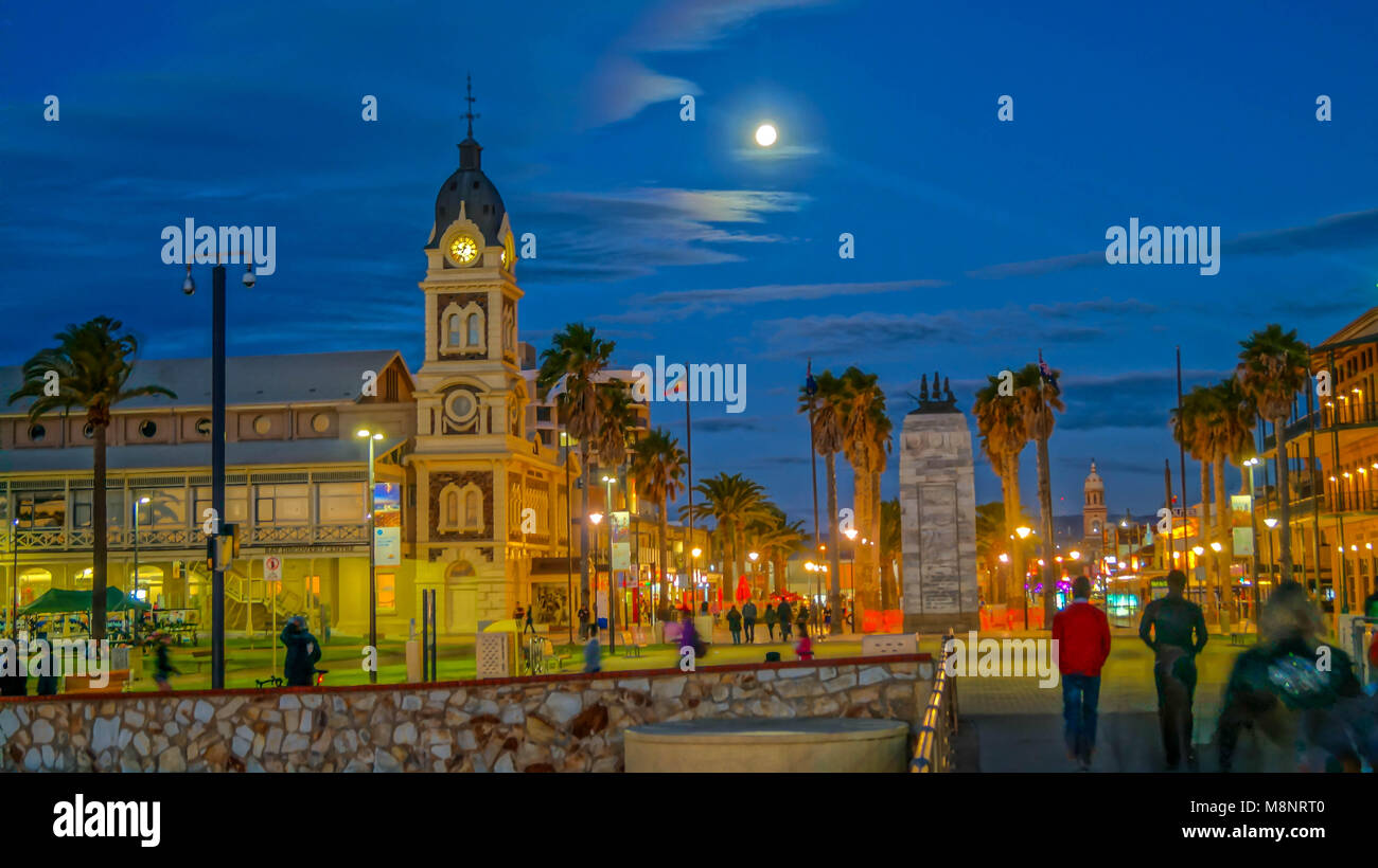 people spending their leisure time on Glenelg beach at night, Adelaide, South Australia Stock Photo