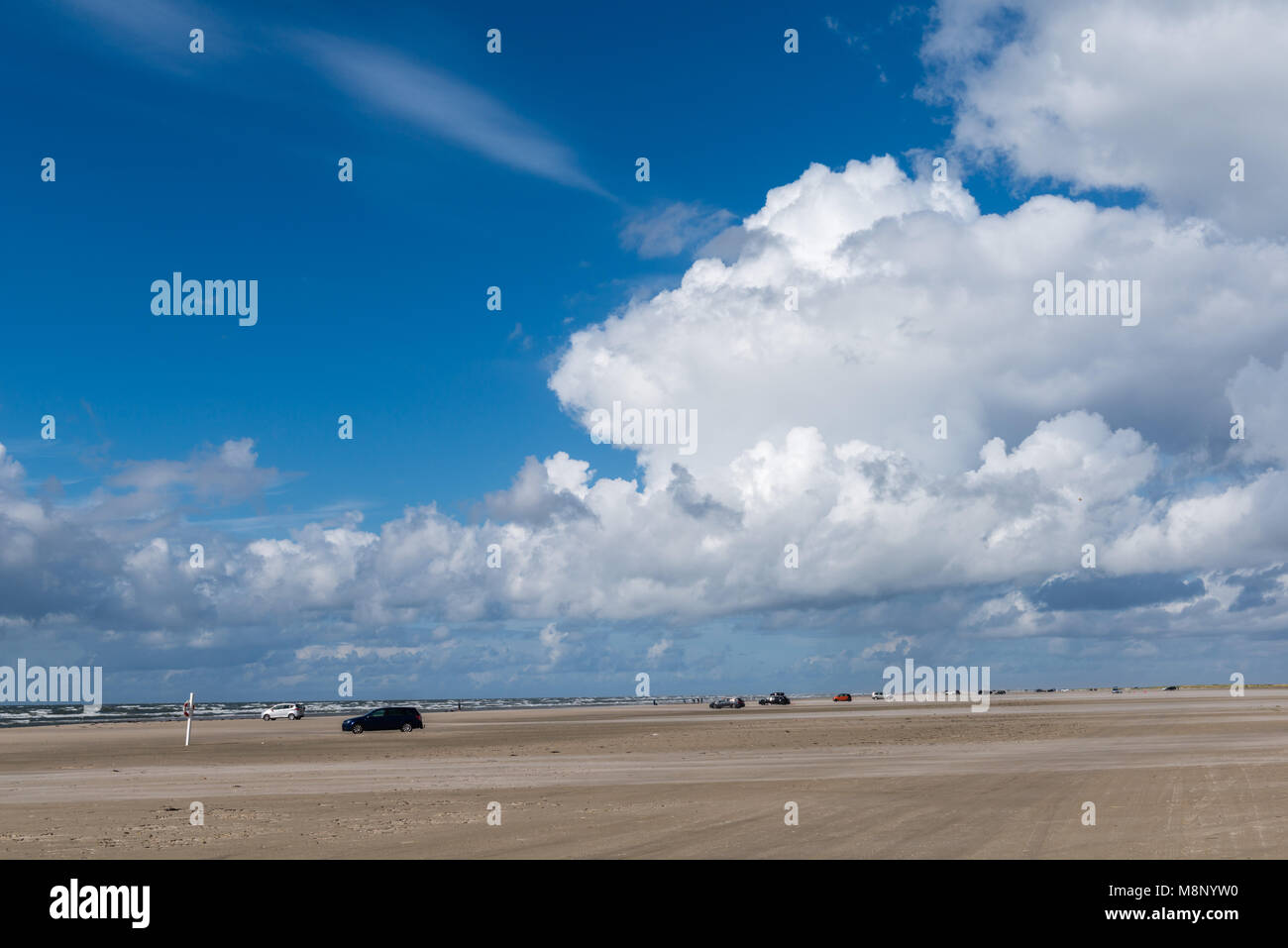 Cars are allowed to drive up the the waterfront at Rindby Beach on Fanoe Island, North Sea, Jutland, Denmark, Scandinavia Stock Photo