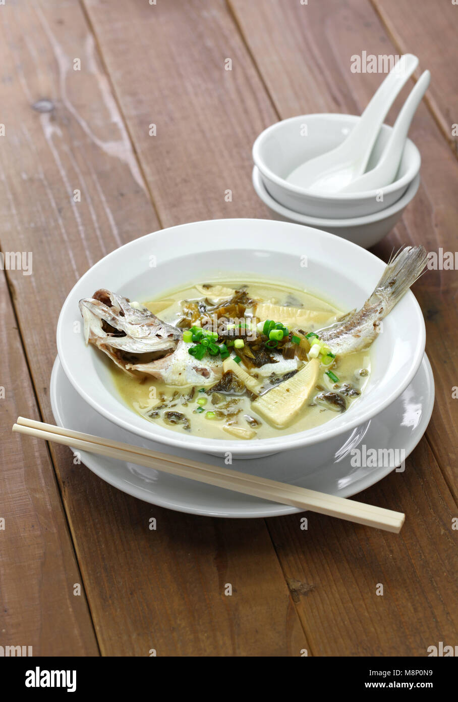 yellow croaker fish soup with preserved snow vegetable, chinese cuisine Stock Photo