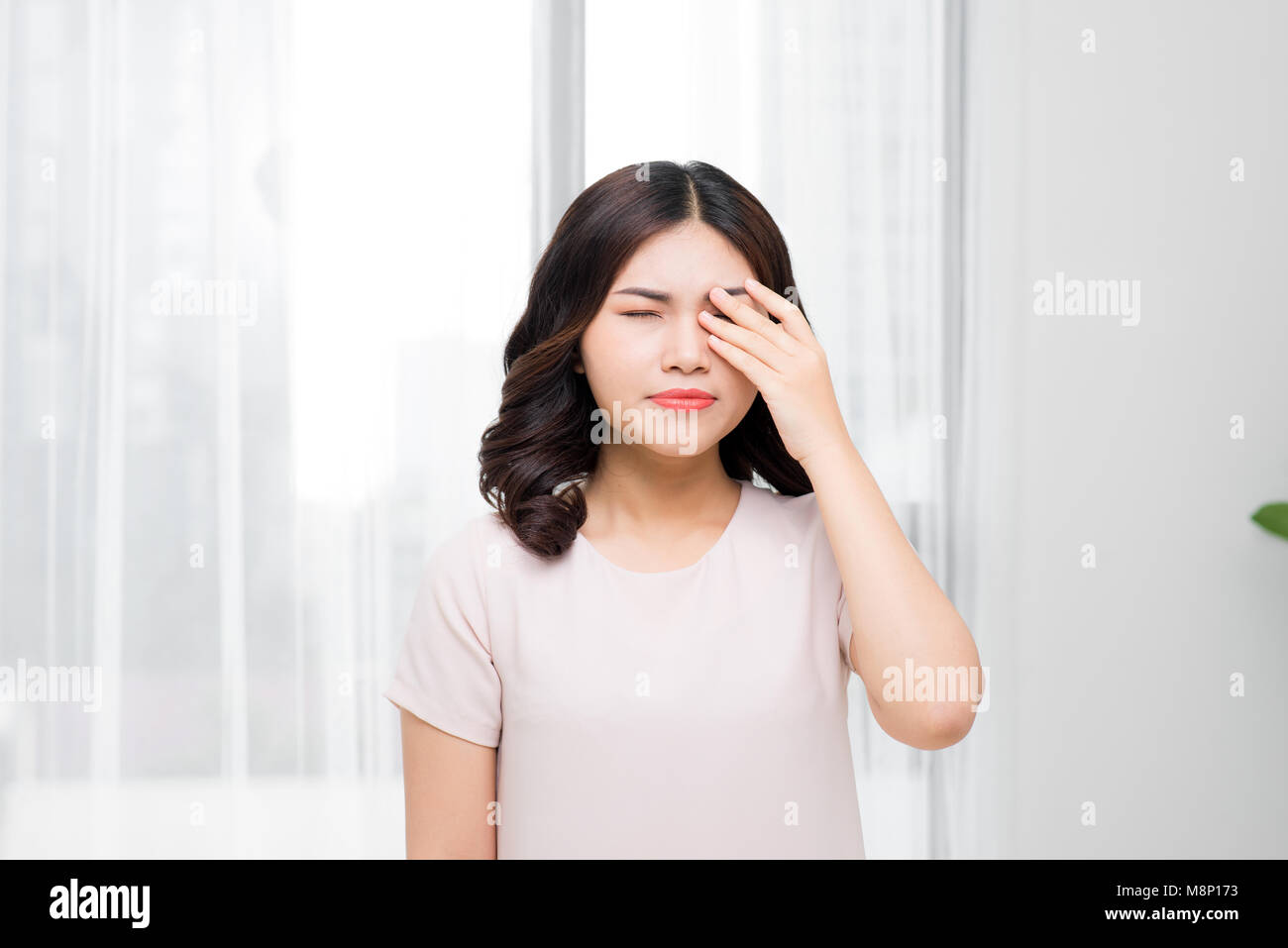 Pain. Tired Exhausted Stressed Woman Suffering From Strong Eye Pain