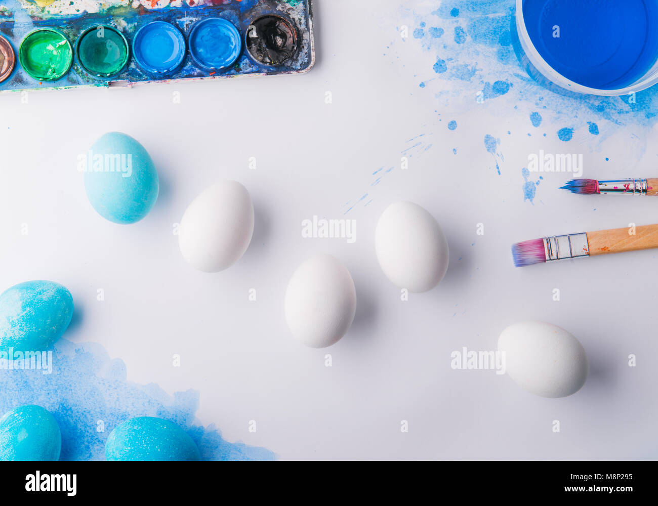 Eggs flat lay on a white background. Easter and spring composition ...
