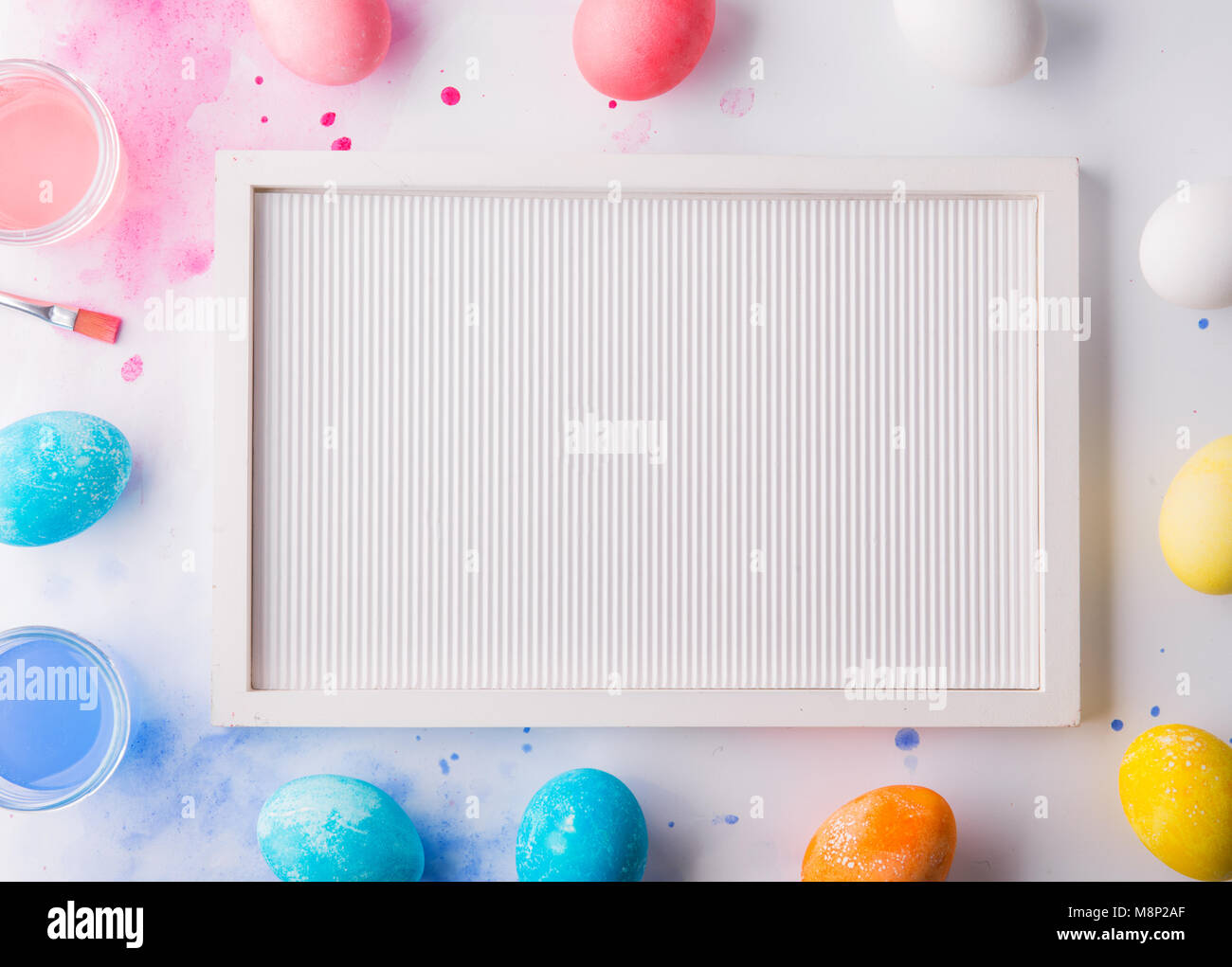 Eggs flat lay on a white background. Easter and spring composition ...
