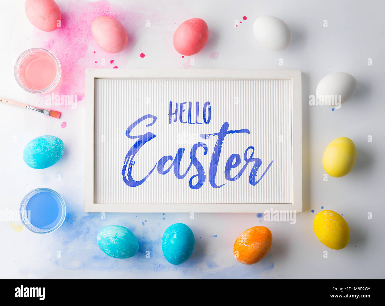 Hello Easter flat lay on a white background. Stock Photo