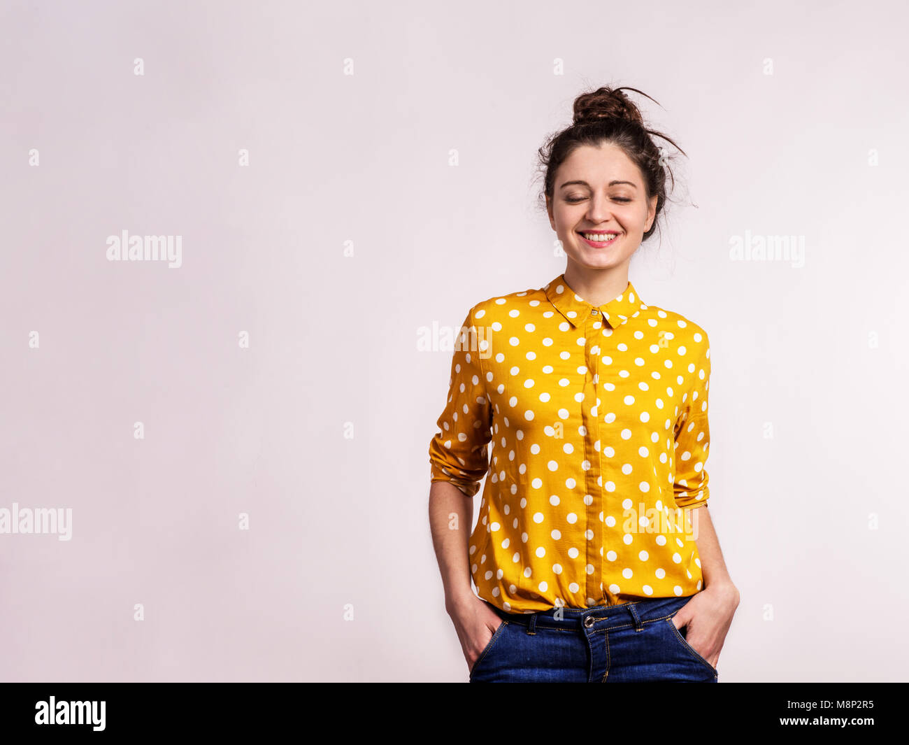 Portrait of a young beautiful woman in studio Stock Photo - Alamy