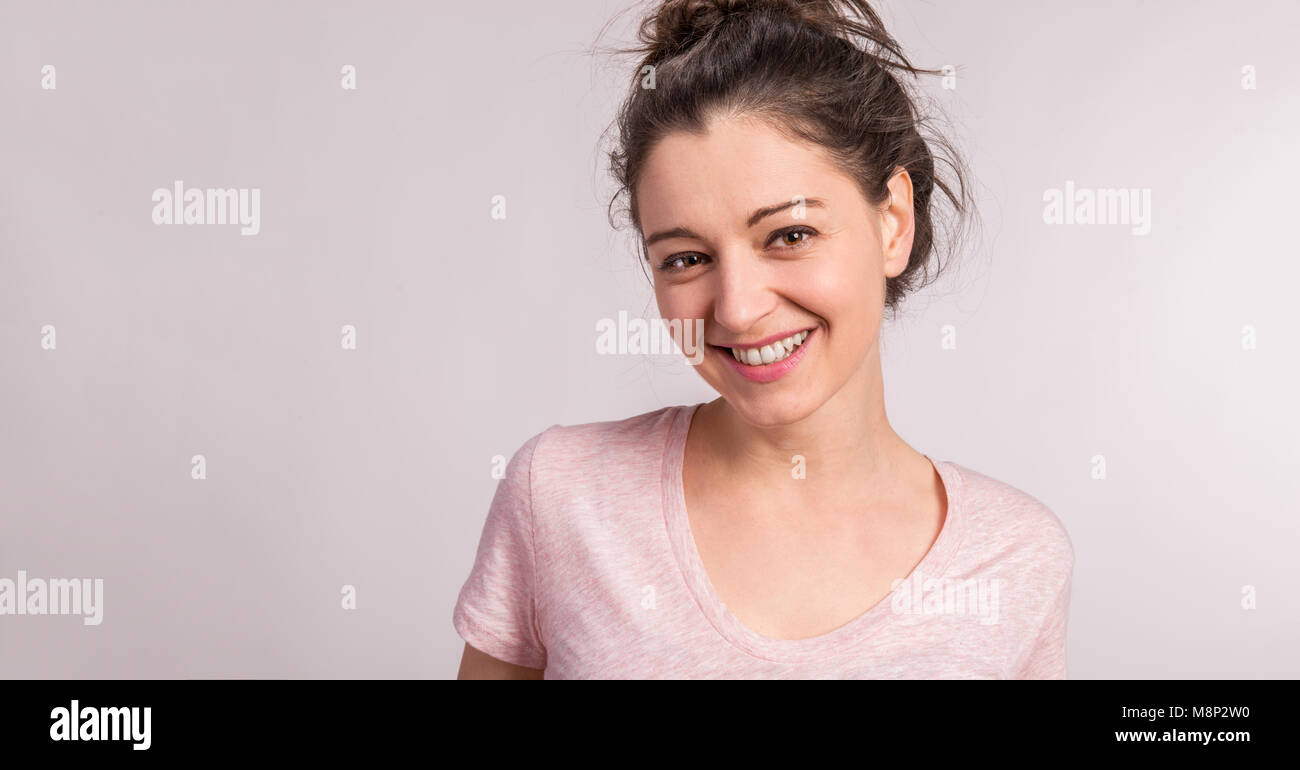 Portrait of a young beautiful woman in studio Stock Photo - Alamy