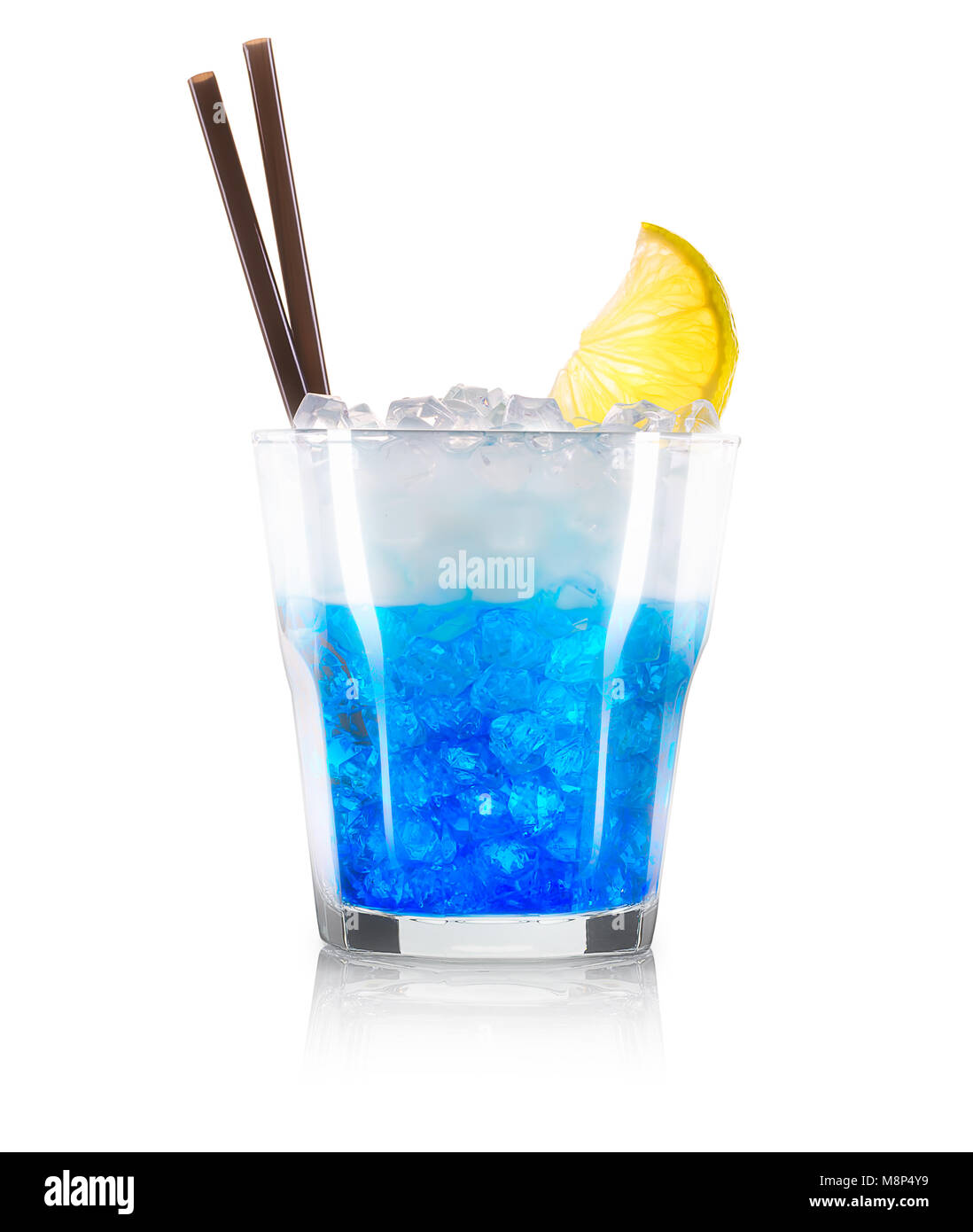 Blue curacao cocktail with lime and black straw Stock Photo