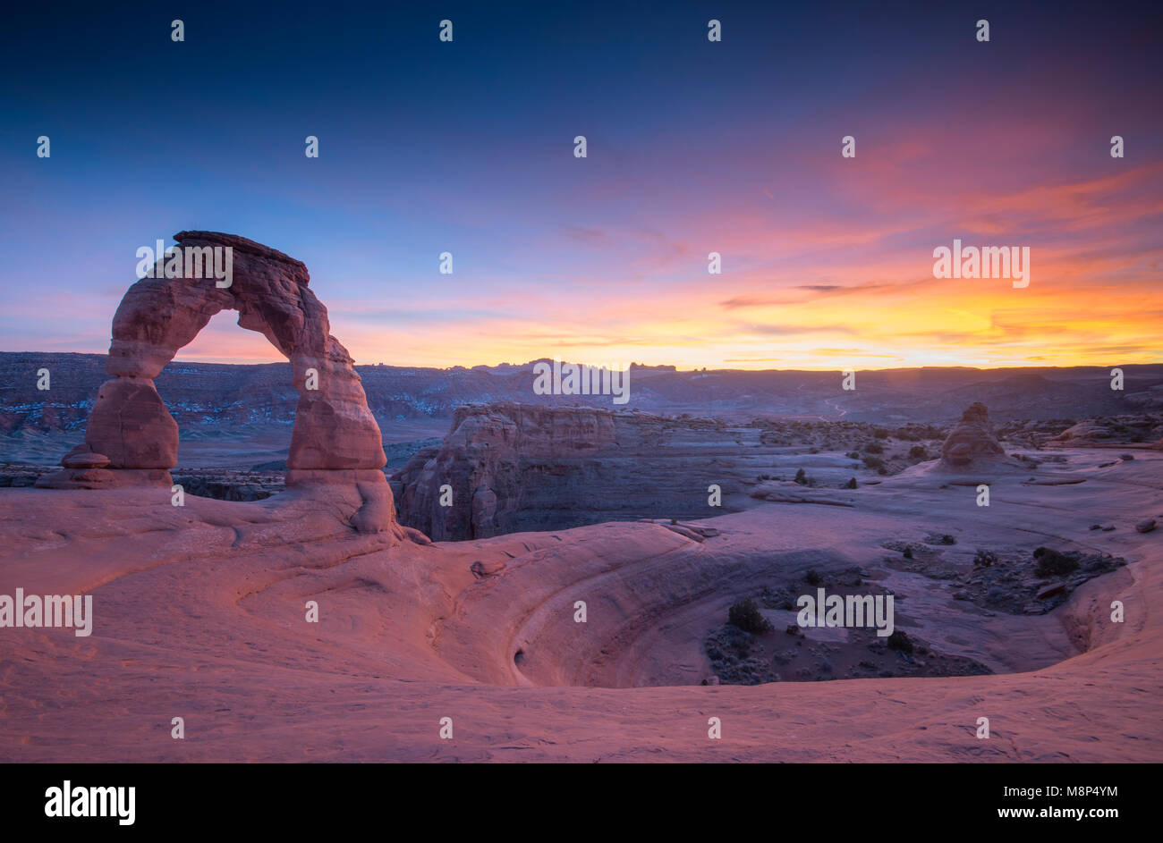 Sunset at Delicate Arch, located in Arches National Park, Utah. Stock Photo