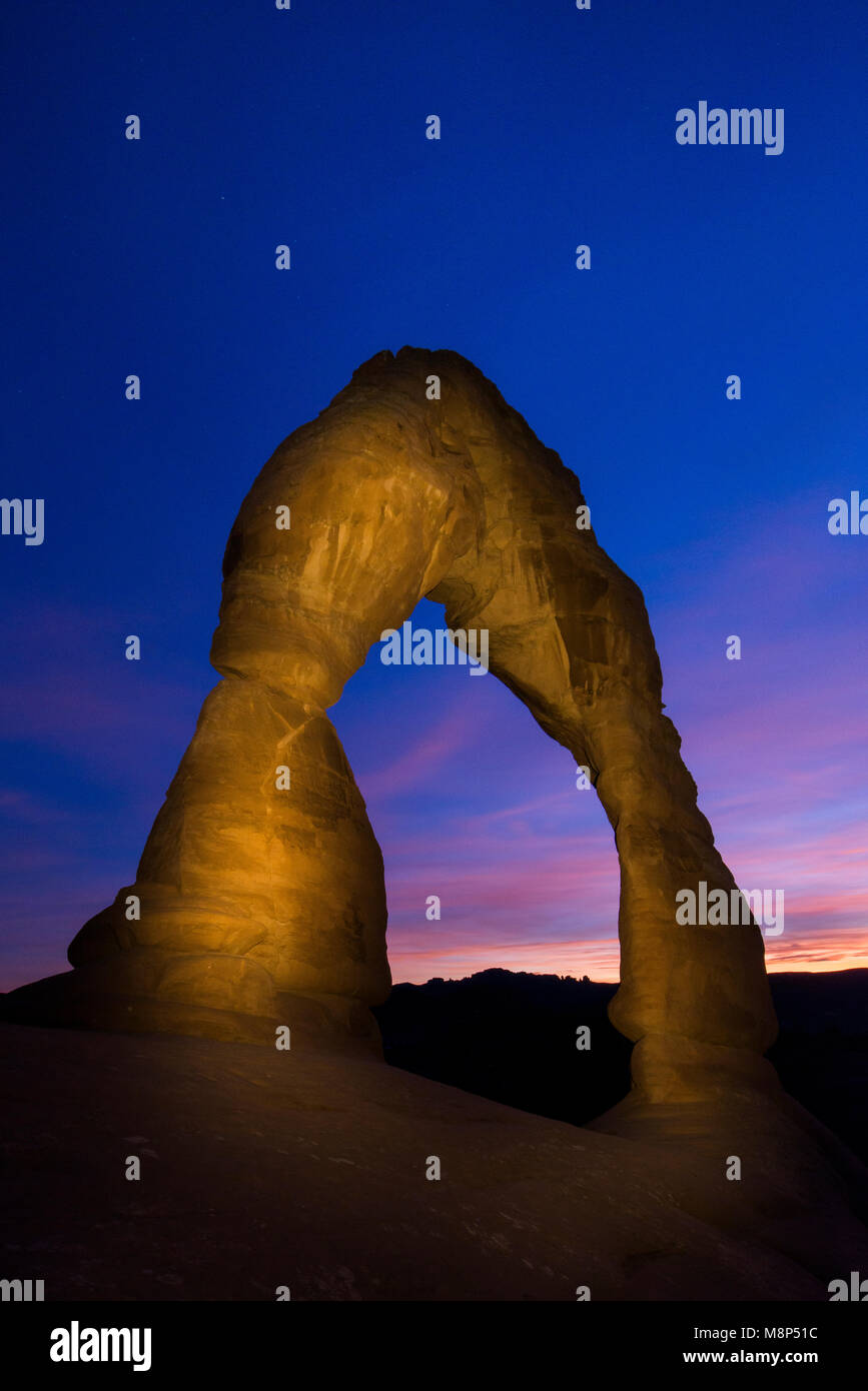 Sunset at Delicate Arch, located in Arches National Park, Utah. Stock Photo