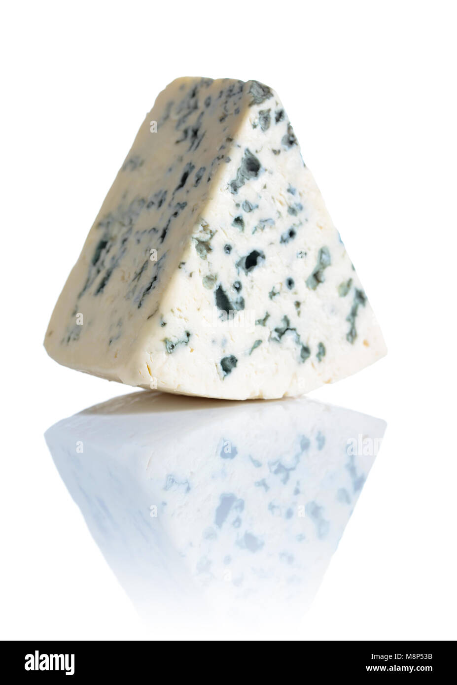 Wedge of soft blue cheese with mold isolated on white background Stock