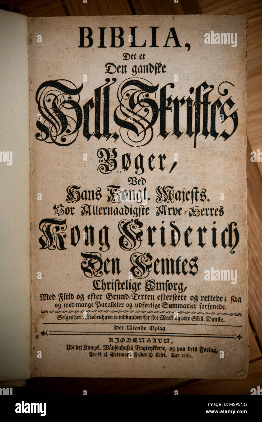 Title page of a family bible from 1760. Printed in Copenhagen during the reign of King Frederick V. Language is Danish. Stock Photo