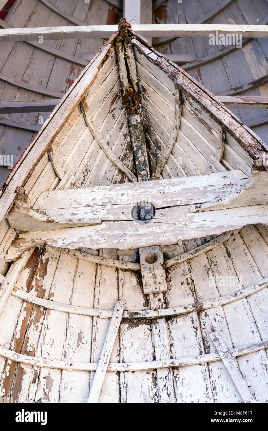 Newport Skiff waiting for restoration at the International Yacht Restoration School, Newport, Rhode Island Stock Photo