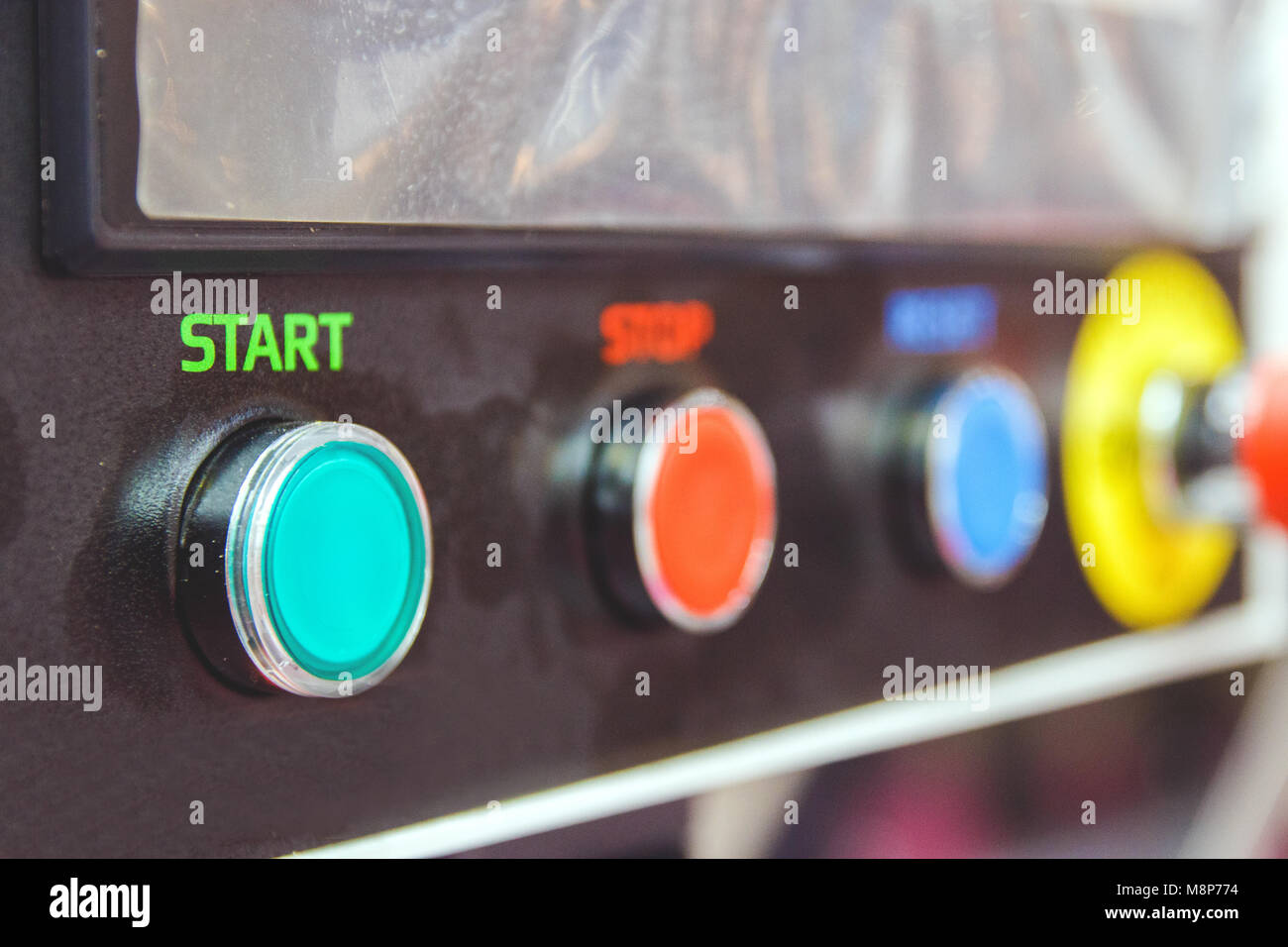 buttons for switching on and off the industrial electrical equipment ...