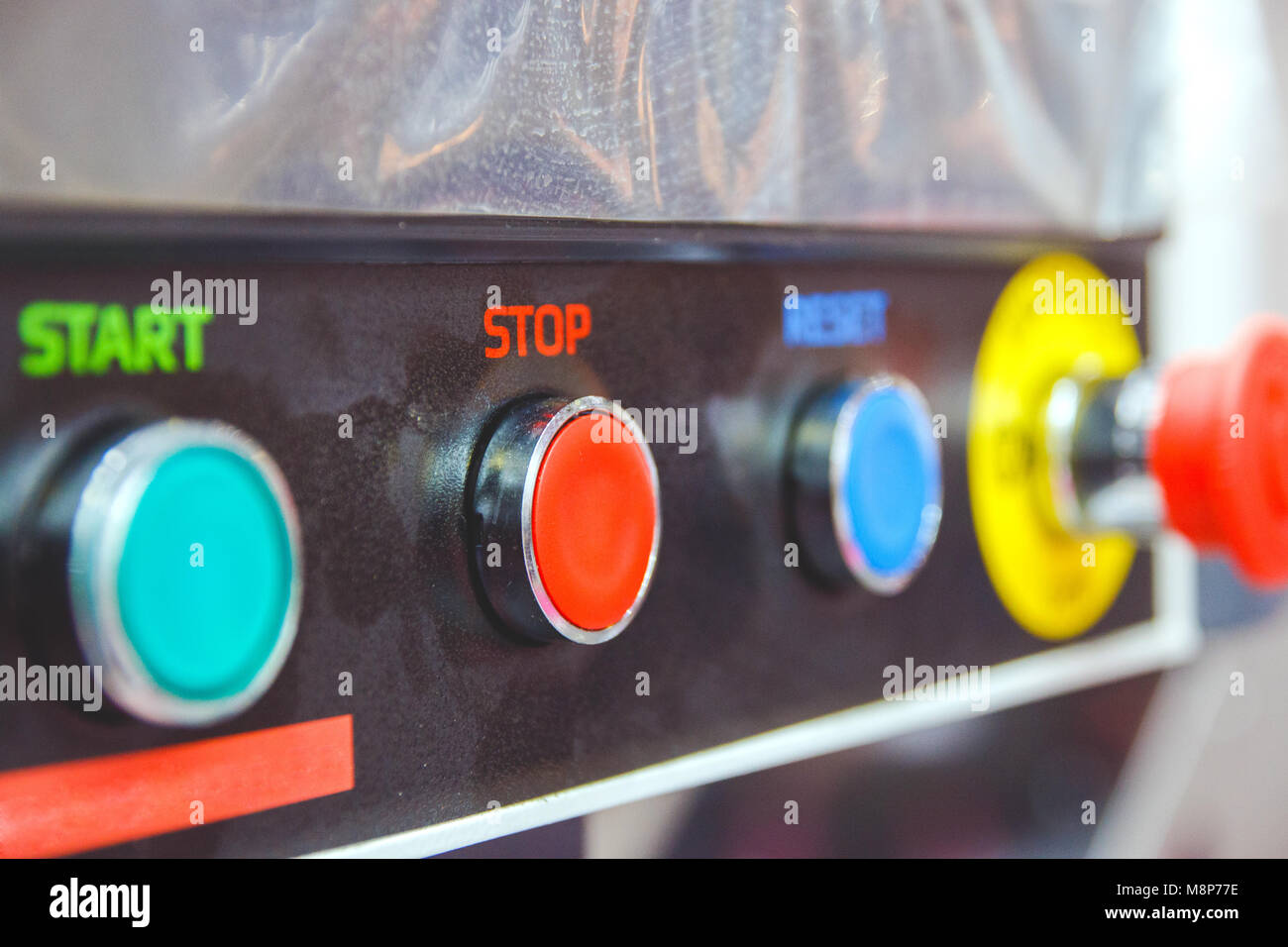 buttons for switching on and off the industrial electrical equipment ...