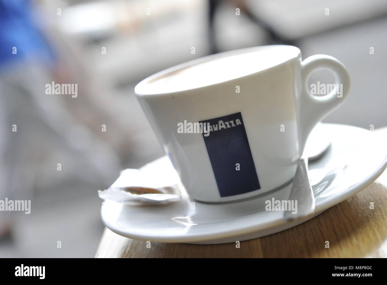 https://c8.alamy.com/comp/M8P8GC/cup-of-lavazza-latte-coffee-in-white-china-cup-with-white-saucer-in-M8P8GC.jpg