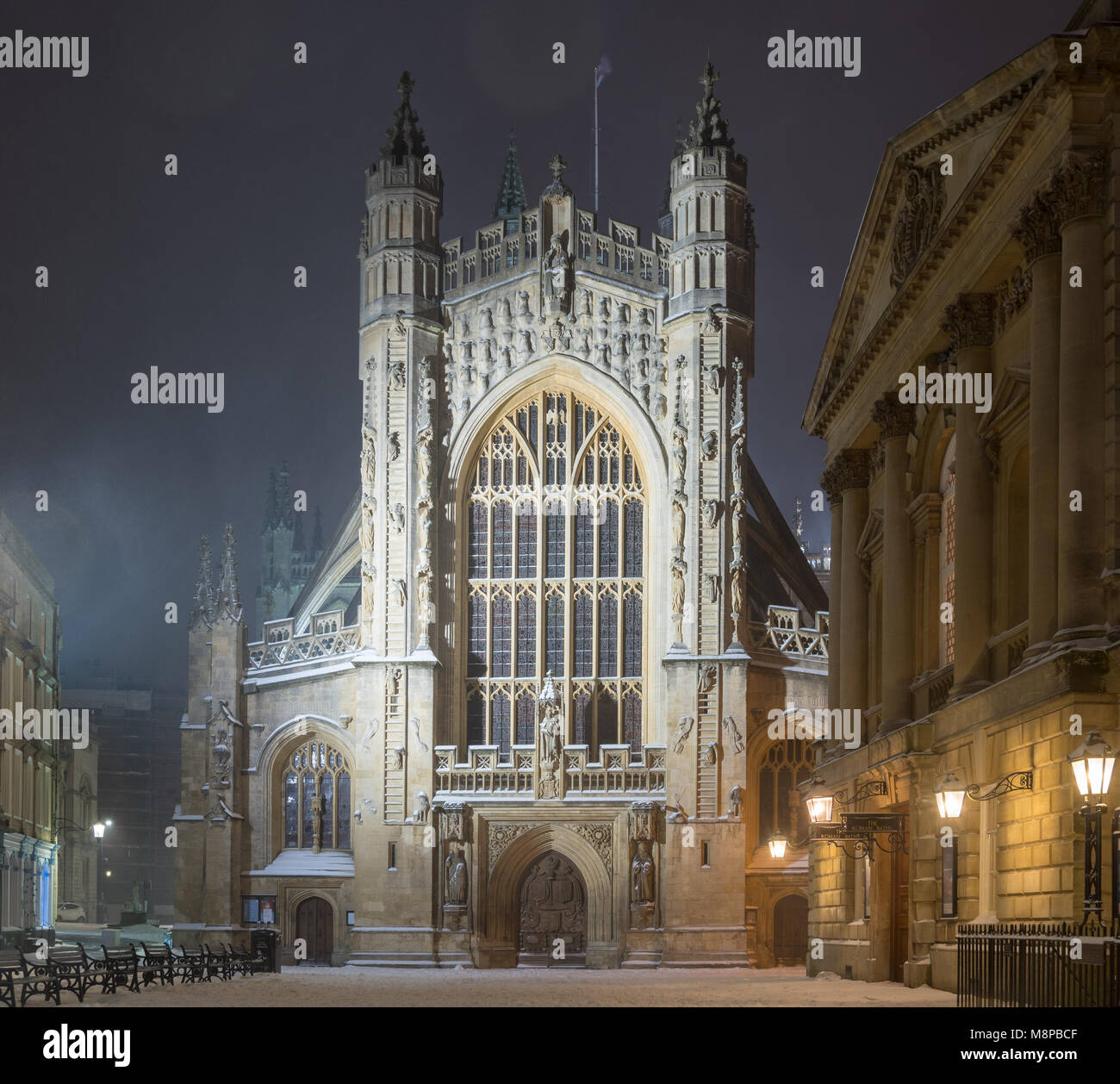 Bath Abbey at night, in the snow. One of Britain's grandest and most imposing Cathedrals in the UNESCO World Heritage City of Bath Stock Photo