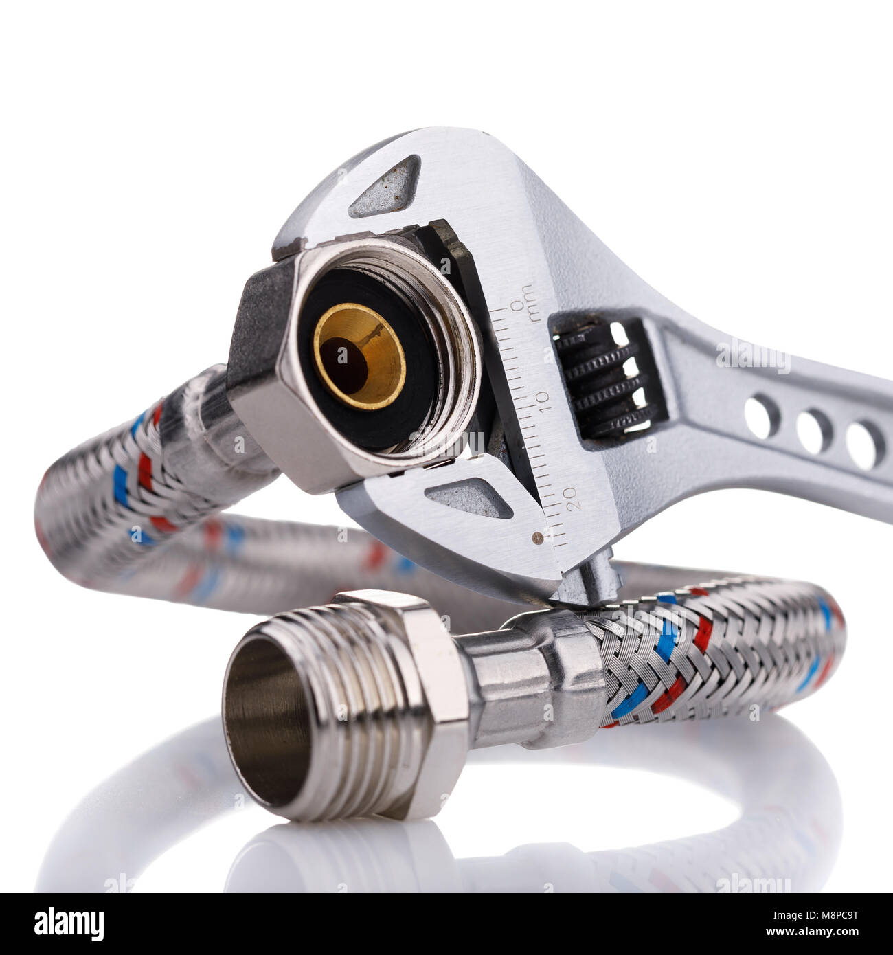 Adjustable wrench with flexible hose isolated on white background Stock Photo Alamy