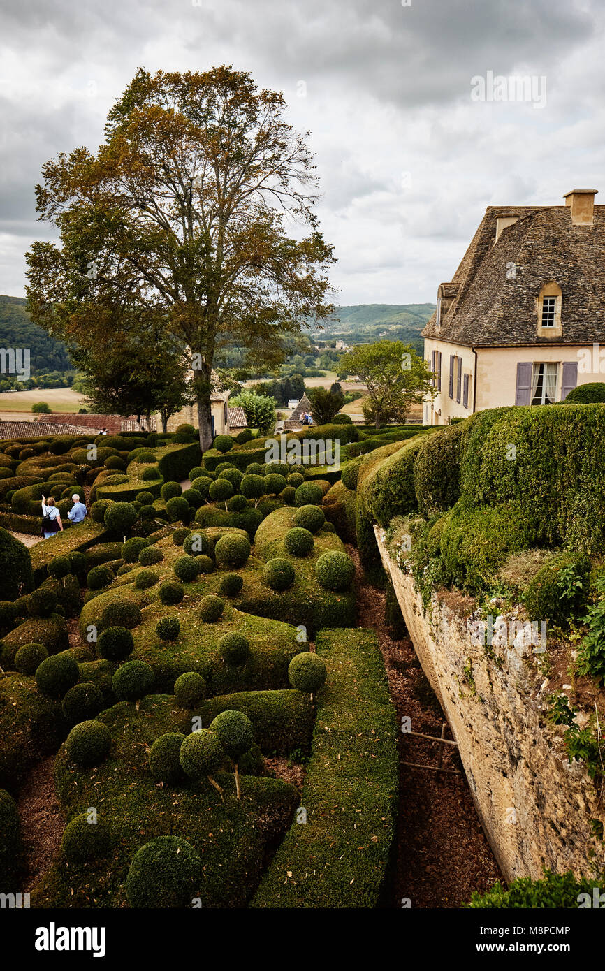 The chateau and gardens of Marqueyssac an enchanting swirl of box hedges set high above the Dordogne river in Vezac France.. Stock Photo