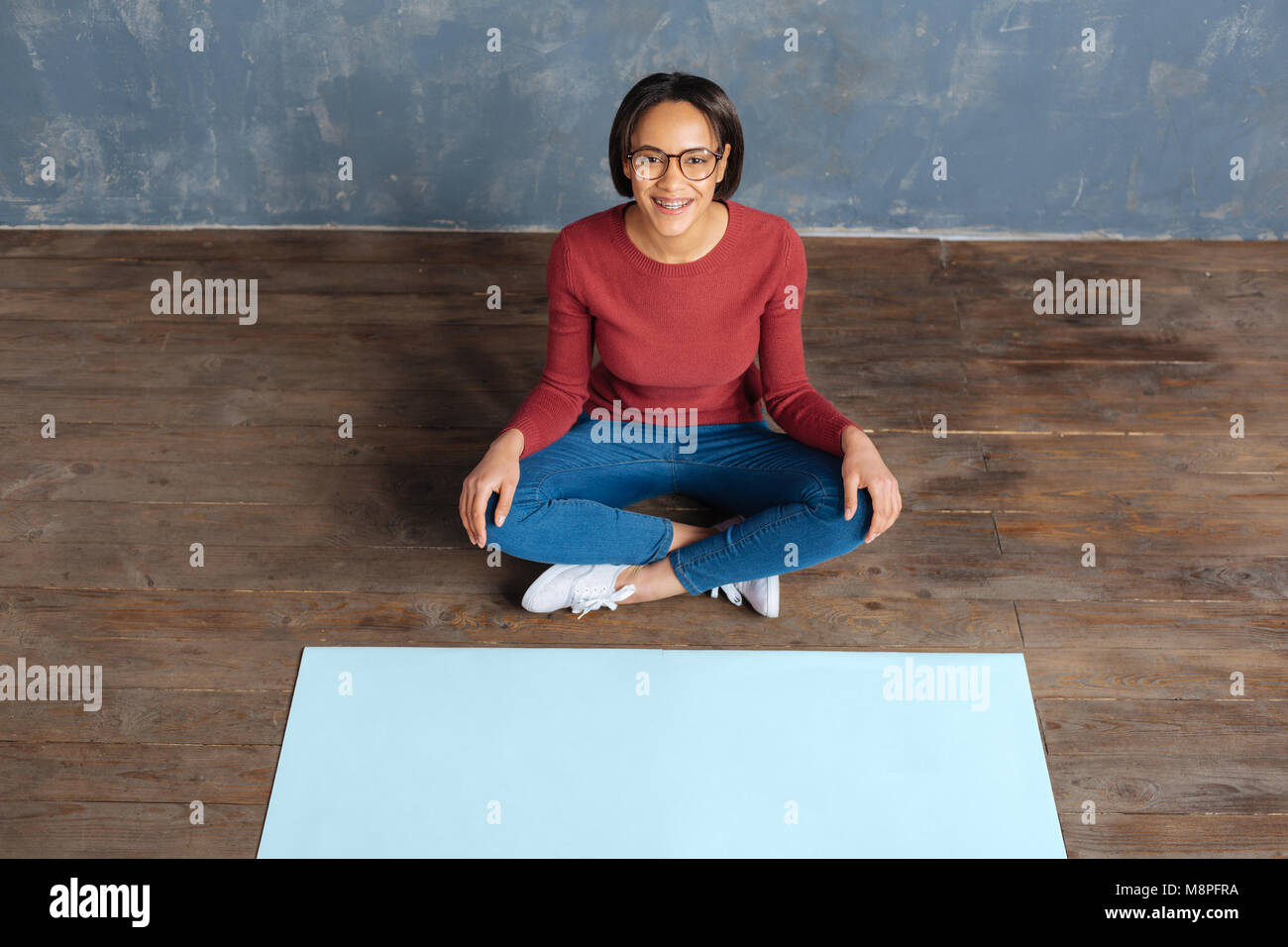 Happy cheerful woman smiling to you Stock Photo