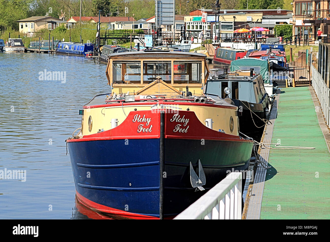 canal boats moored on a bright sunny day waiting for lock gates to open at beeston locks on the river trent, nottingham, england uk. Stock Photo