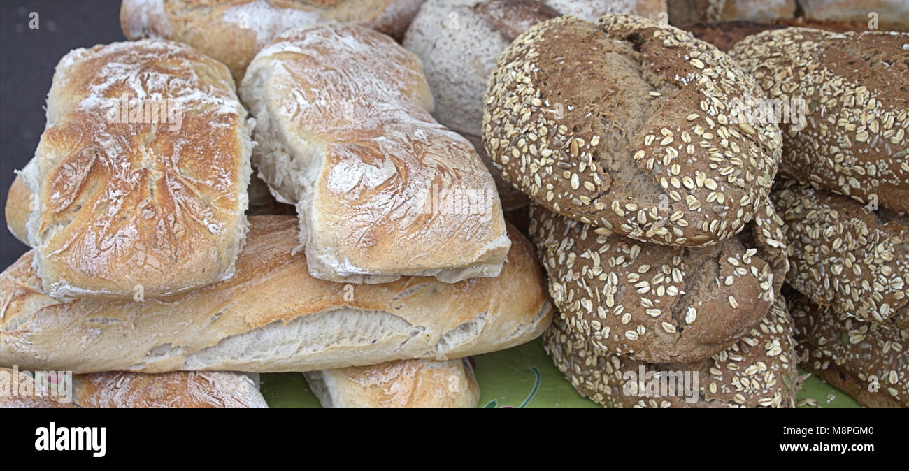 freshly baked bread on sale at the local weekly food market of skibbereen, west cork. Stock Photo