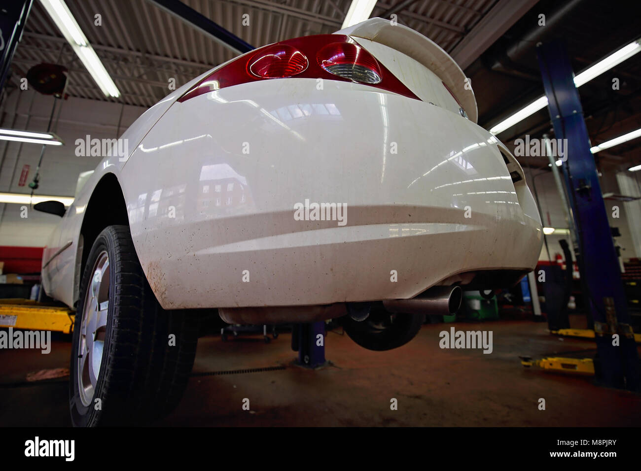 Professional car repair service in downtown garage Stock Photo Alamy