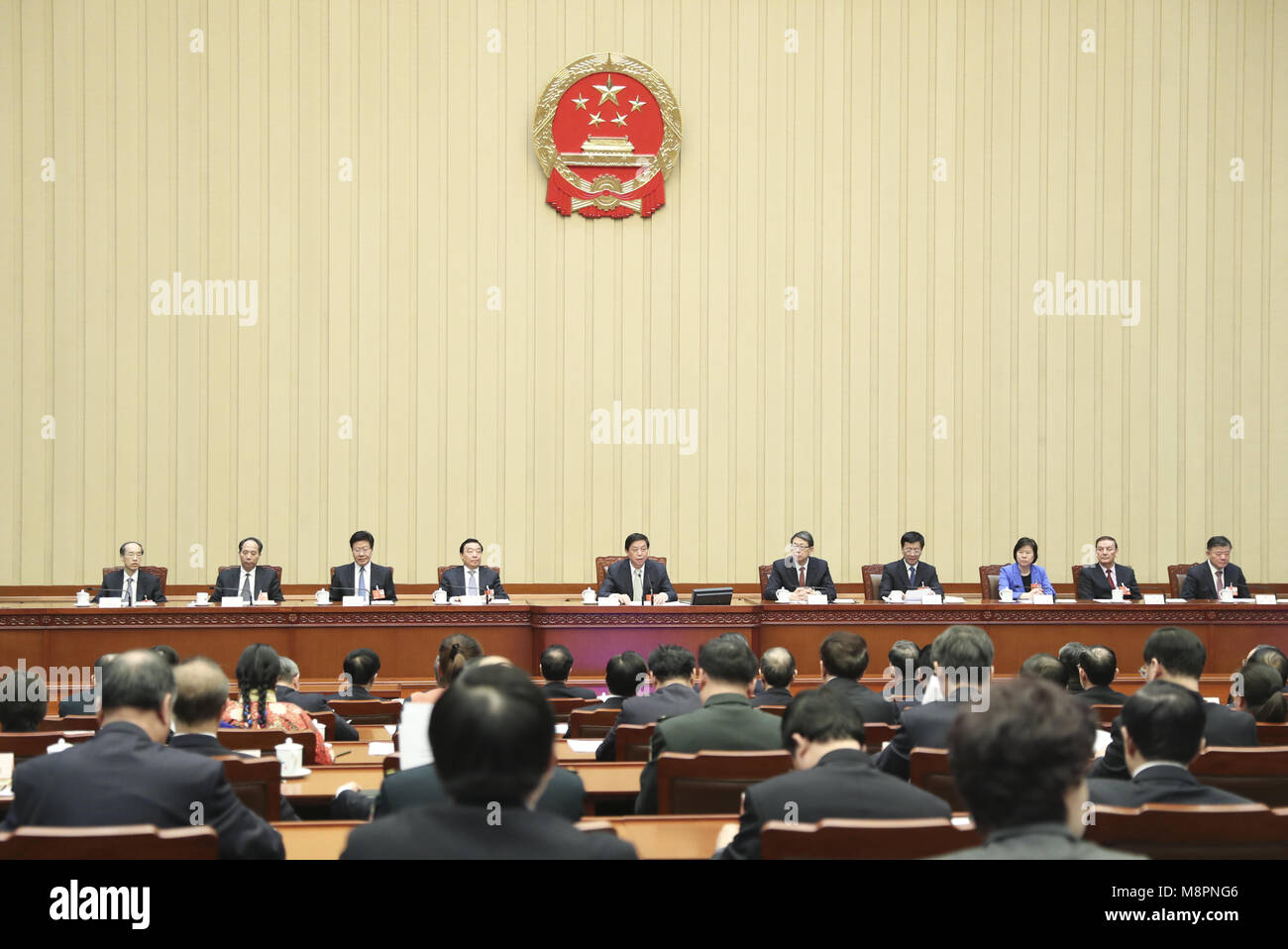 Beijing, China. 19th Mar, 2018. Li Zhanshu, executive chairperson of the presidium of the first session of the 13th National People's Congress (NPC), presides over the 11th meeting of the presidium at the Great Hall of the People in Beijing, capital of China, March 19, 2018. Credit: Xie Huanchi/Xinhua/Alamy Live News Stock Photo