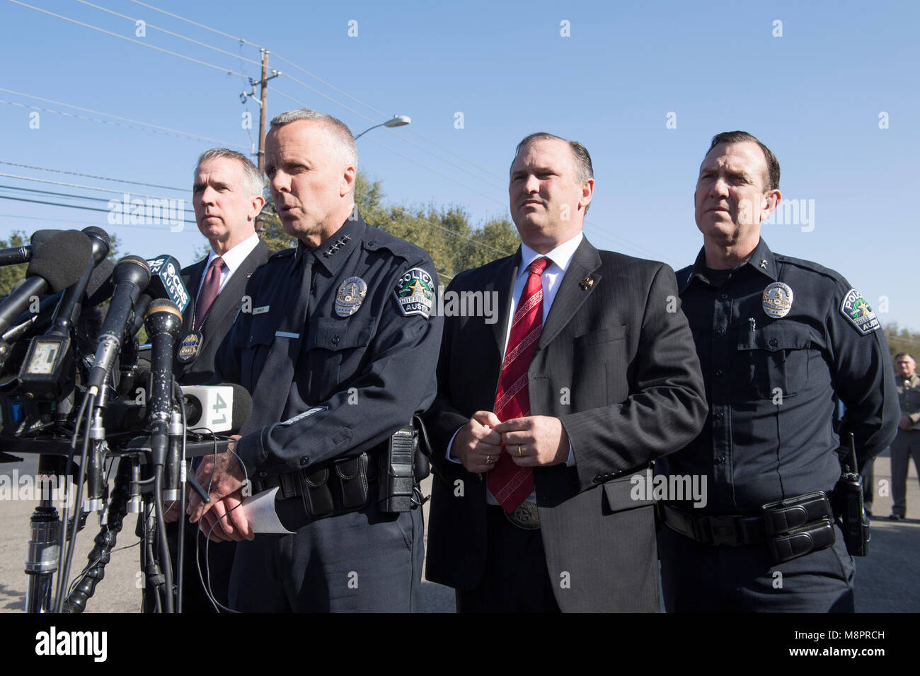austin-texas-interim-police-chief-brian-manley-fbi-special-agent-christopher-combs-r-and-atf-chief-fred-milanowski-speak-to-press-as-they-work-at-the-crime-scene-where-a-fourth-package