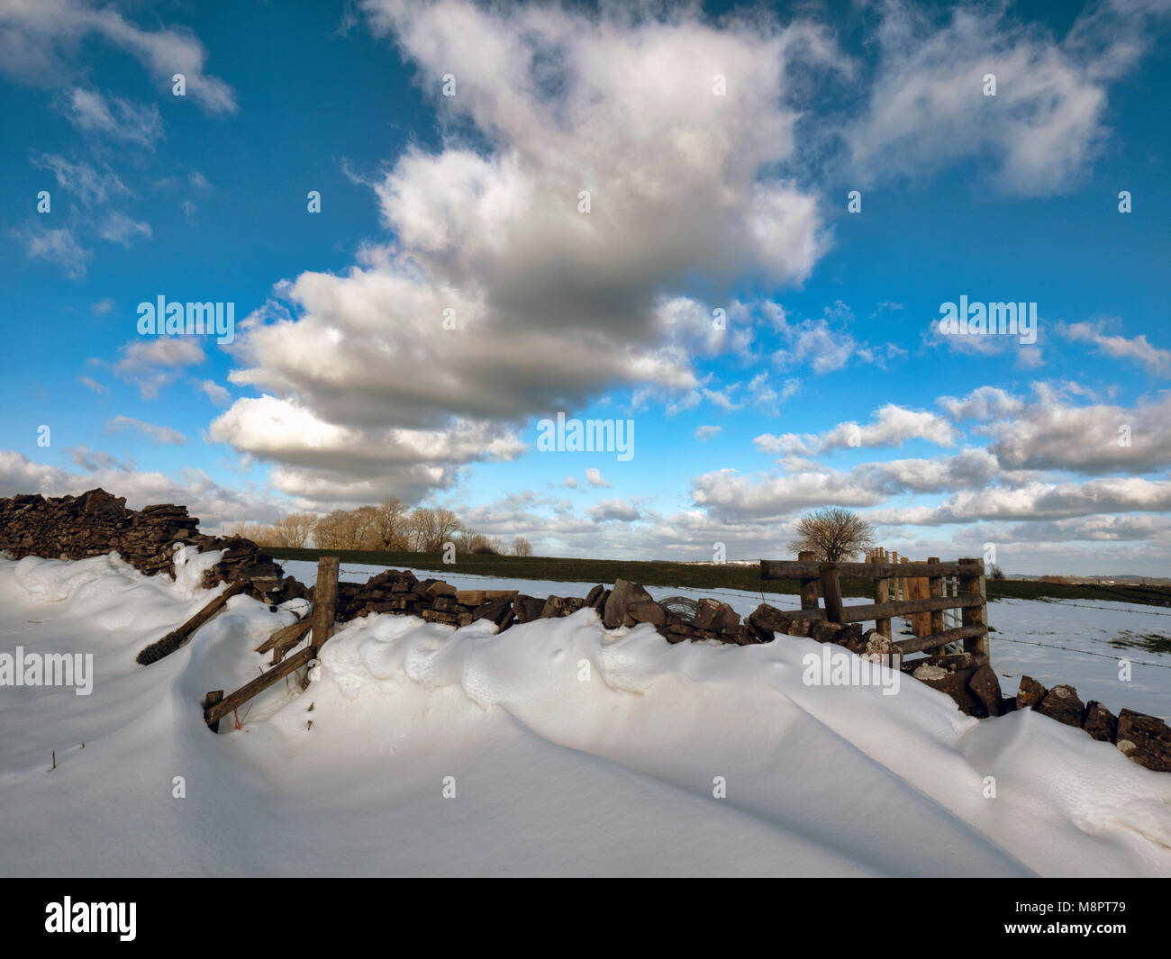 Tissington, Peak District National Park, Derbyshire, UK. 19th March, 2018. UK Weather: The last of the drifted snow as it melts near the village of Tissington in the Peak District National Park, Derbyshire, England, UK Credit: Doug Blane/Alamy Live News Stock Photo