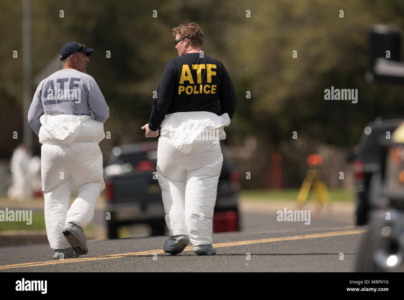 ATF and FBI agents work into the afternoon as a fourth package bomb  exploded on a southwest Austin roadside injuring two men. Stock Photo