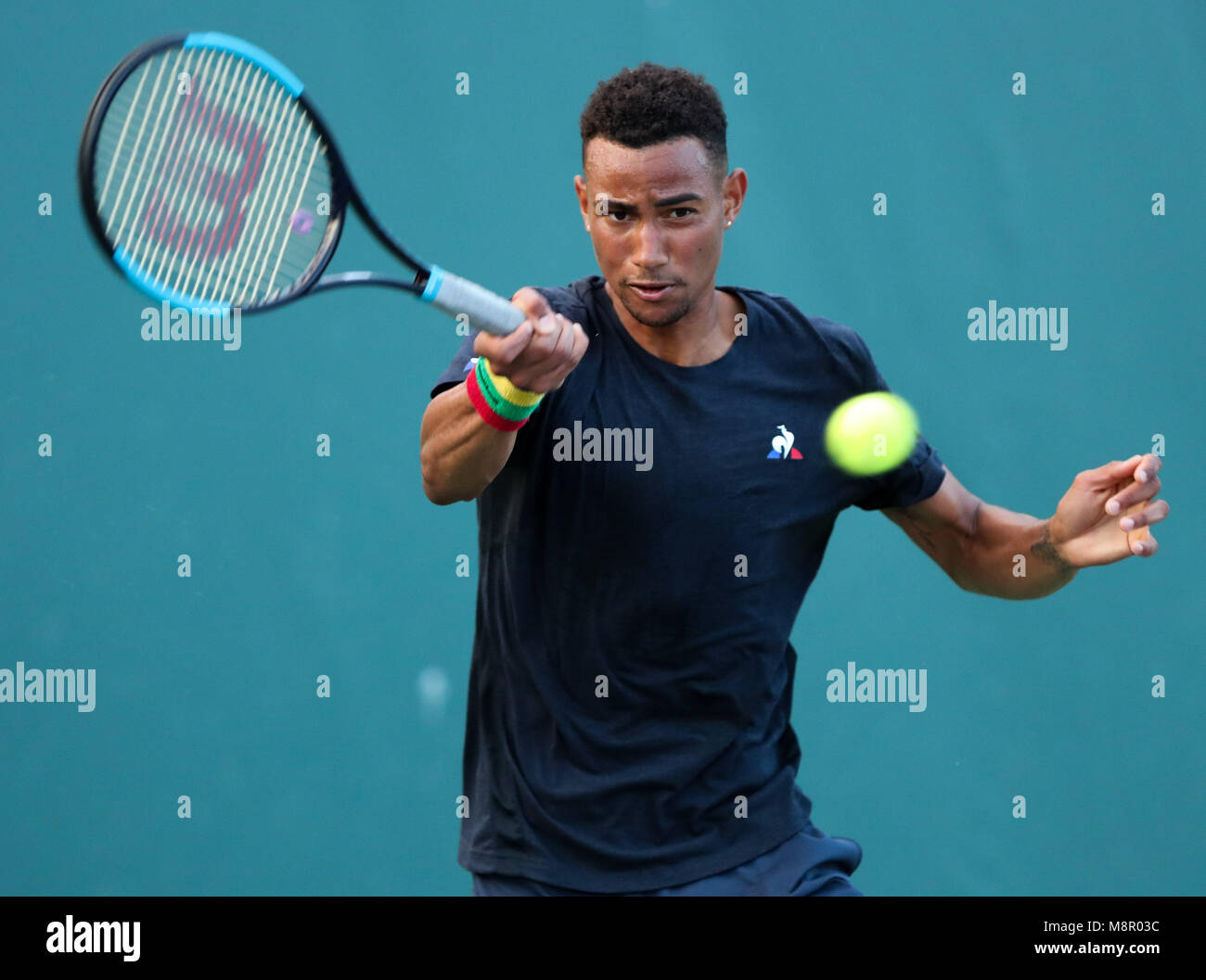 Key Biscayne, Florida, USA. 19th Mar, 2018. Calvin Hemery from France  returns against Yannick Hanfmann from Germany during a qualifying round at  the 2018 Miami Open presented by Itau professional tennis tournament,