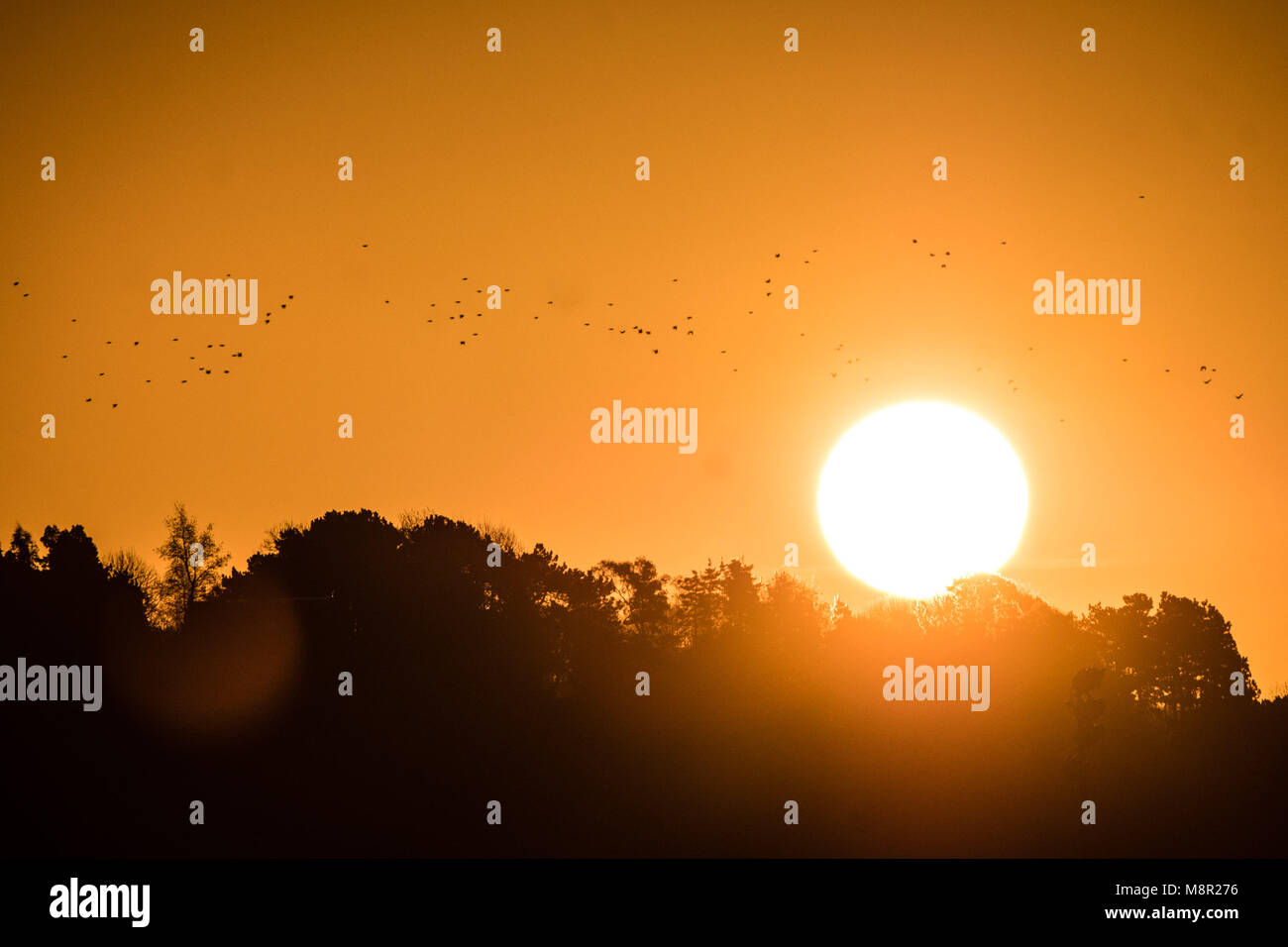 Aberystwyth Wales UK, Tuesday 20 March 2018 UK Weather: The sun rises gloriously on Spring Equinox morning in Aberystwyth on the west coast of Wales. With day and night of equal length, the spring equinox today marks the start of 'astronomical spring' photo Credit: Keith Morris/Alamy Live News Stock Photo