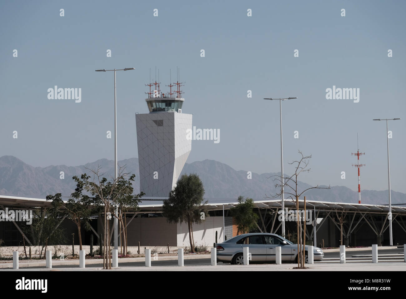 Arava, Israel. 19th March, 2018. View showing the control tower of the newest Ilan and Assaf Ramon International Airport currently under construction near the southern city of Eilat. The new civilian airport which is due to open in a few months, has created advanced construction technology and is protected by a 30-meter high fence which will feature electronics, sensors and detection technology to ensure that incoming and departing planes are protected from all types of threats. Credit: Eddie Gerald/Alamy Live News Stock Photo