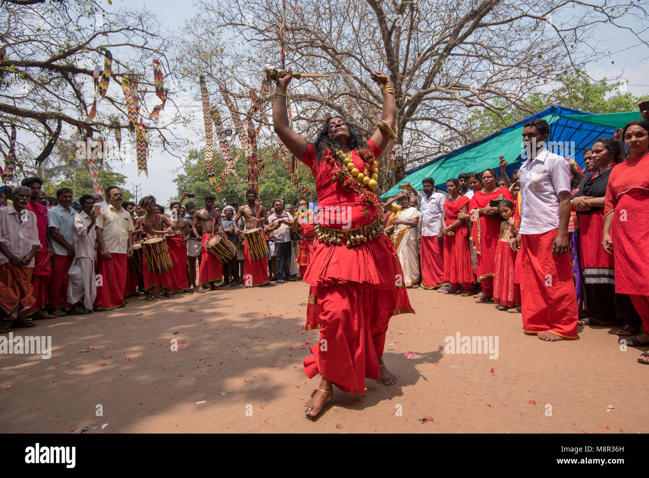 Kodungallur, India. 19 Mar 2018. A devotee dancing in trance in front
