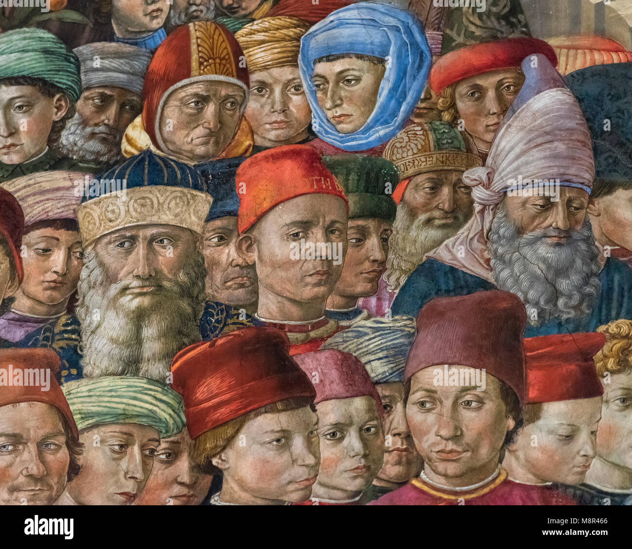 Florence. Italy. Self portrait of the artist (centre, with scroll on his red hat, reading Opus Benotii) Benozzo Gozzoli. Cappella dei Medici. Stock Photo