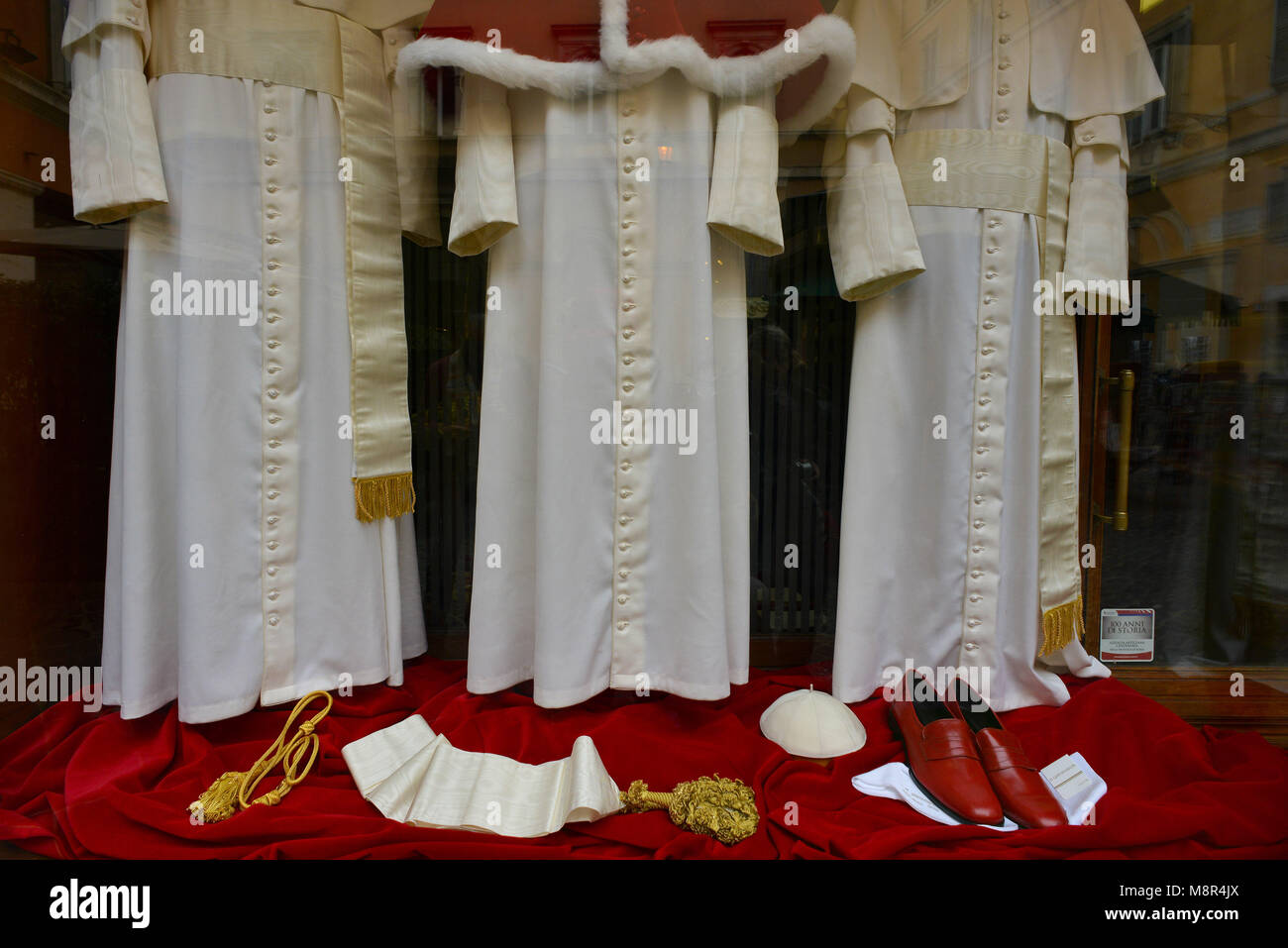 Rome. Garments for the next Pope are displayed at the Gammarelli Atelier on March 5, 2013 in Rome, Italy. The Gammarelli Family produced dresses for P Stock Photo